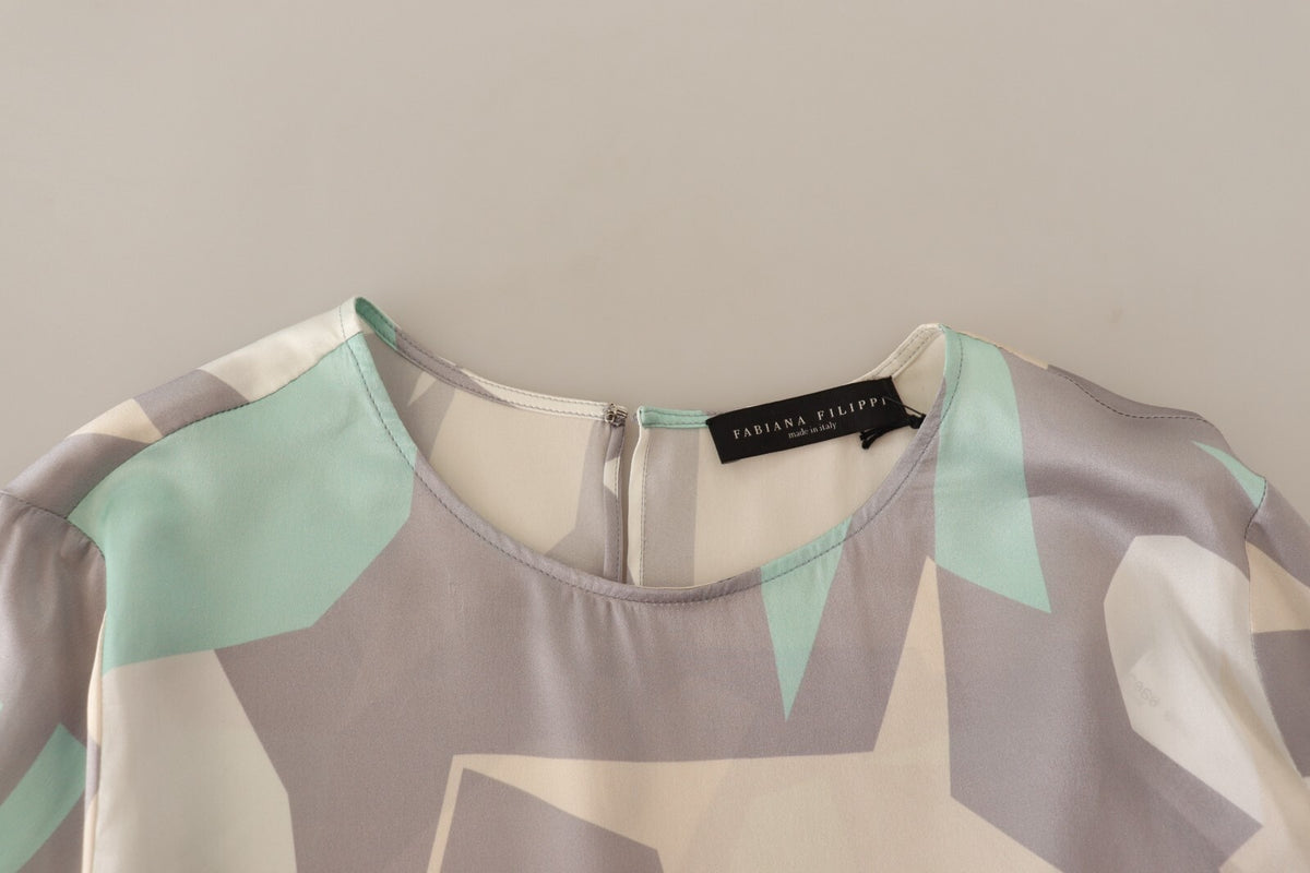 Elevate your wardrobe with the Fabiana Filippi Multicolor Silk Long Sleeves Top, a masterpiece of luxurious silk that embodies sophistication and timeless elegance.