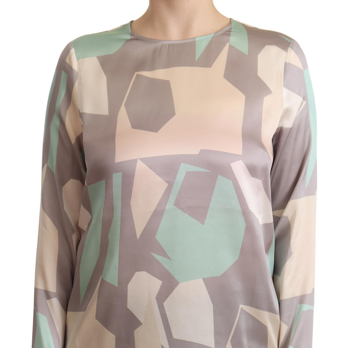 Indulge in the exquisite elegance of Fabiana Filippi's Multicolor Silk Long Sleeves Top, a masterpiece of luxurious silk that embodies sophistication and timeless allure.