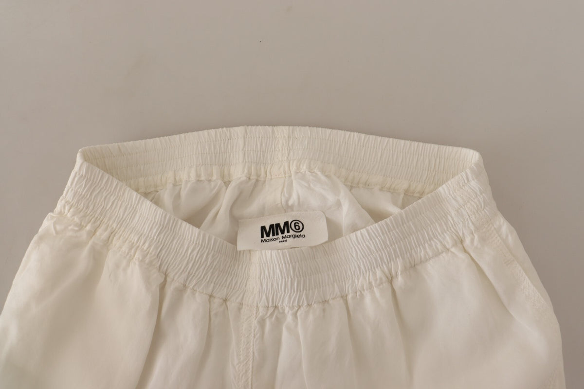 Elevate your style with Maison Margiela's White High Waist Cropped Trouser Pants, crafted from luxurious viscose, embodying timeless elegance and exquisite craftsmanship.