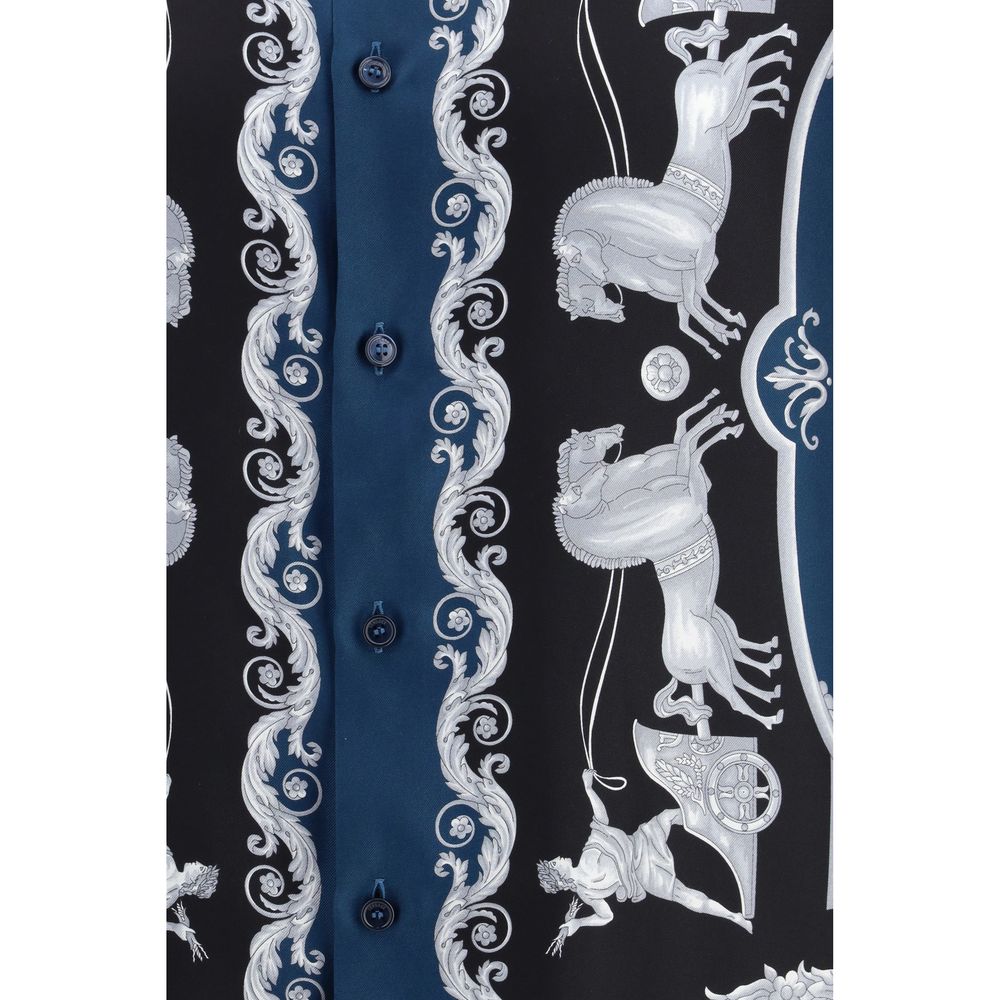 Indulge in the Versace Blue Silk Pattern Shirt, a masterpiece of luxurious silk twill and exquisite artistry, embodying timeless elegance for the discerning individual.