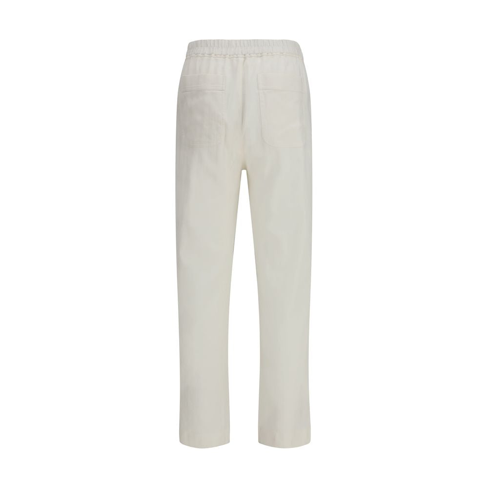 Indulge in the exquisite craftsmanship of Tom Ford's White Cotton Casual Pants, a luxurious blend of cotton and silk, redefining modern elegance for discerning tastes.