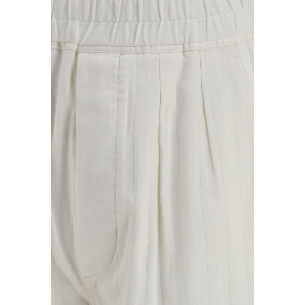 Indulge in Tom Ford's White Cotton Casual Pants from the SS26 collection, a luxurious blend of cotton and silk, embodying effortless sophistication and timeless elegance.