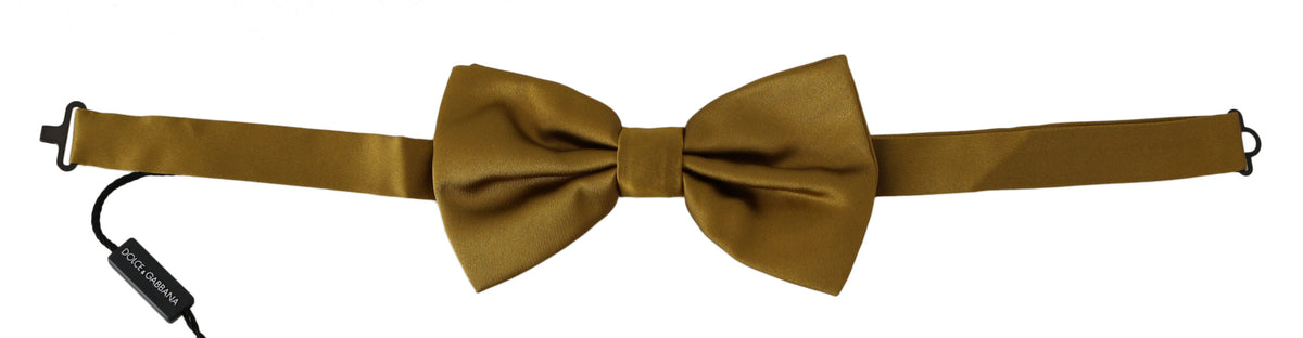 Elevate your style with the Dolce & Gabbana Yellow Mustard Silk Butterfly Bow Tie, a luxurious accessory that embodies sophistication and timeless elegance for any occasion.