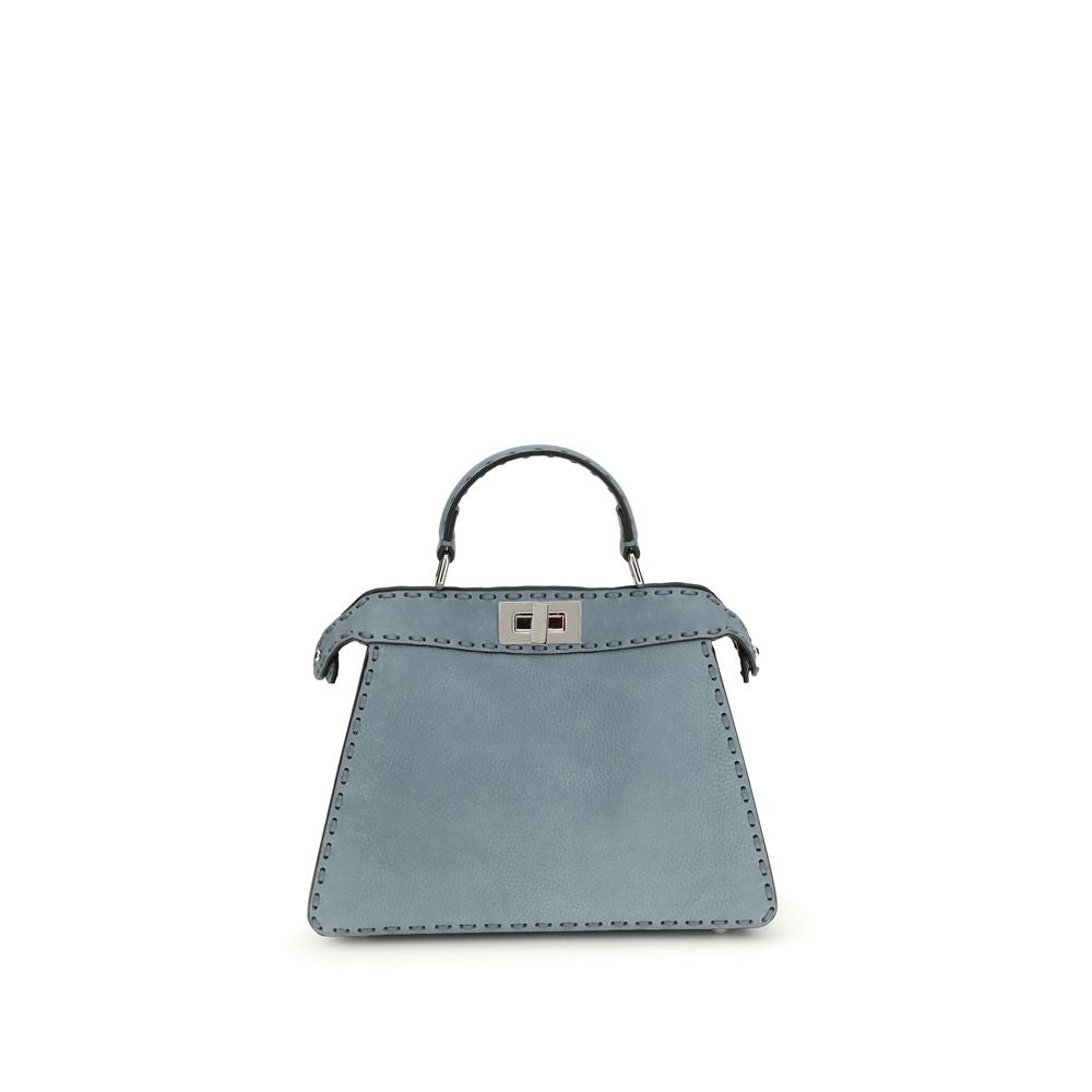 Indulge in the Fendi Light Blue Calf Leather Bos Taurus Handbag, a masterful blend of artisanal craftsmanship and timeless elegance, perfect for discerning tastes.