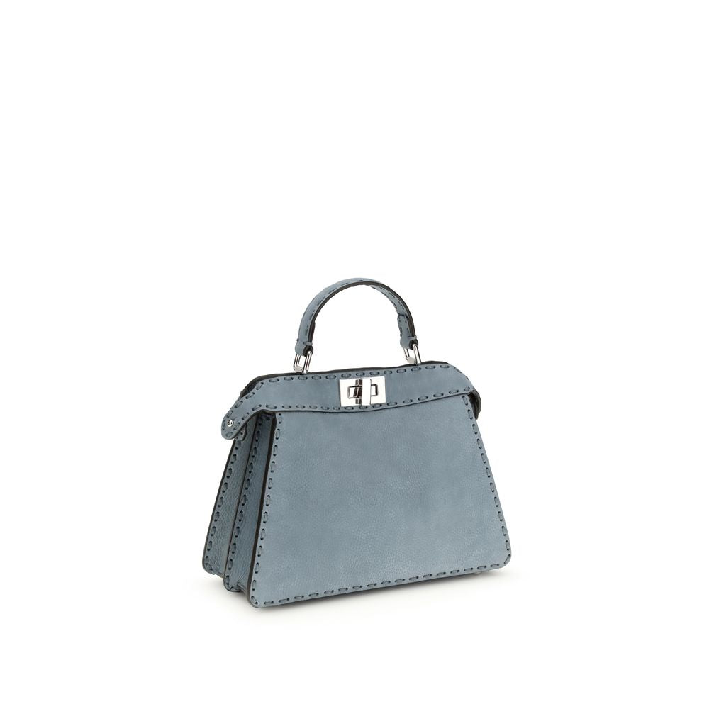 Experience the allure of the Fendi Light Blue Calf Leather Bos Taurus Handbag, a testament to exquisite craftsmanship and timeless elegance for the discerning connoisseur.