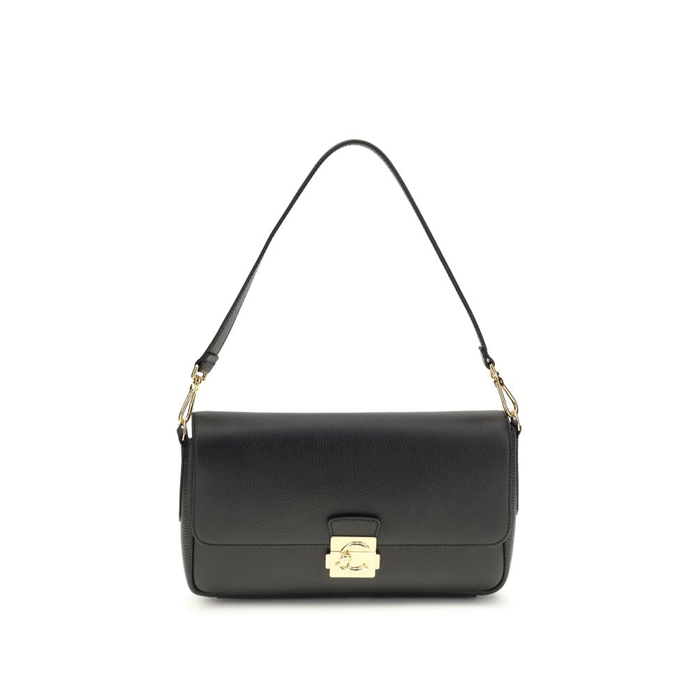 Indulge in the Coccinelle Black Calf Leather Bos Taurus Shoulder Bag, a masterpiece of exquisite craftsmanship and timeless elegance, perfect for the discerning individual.