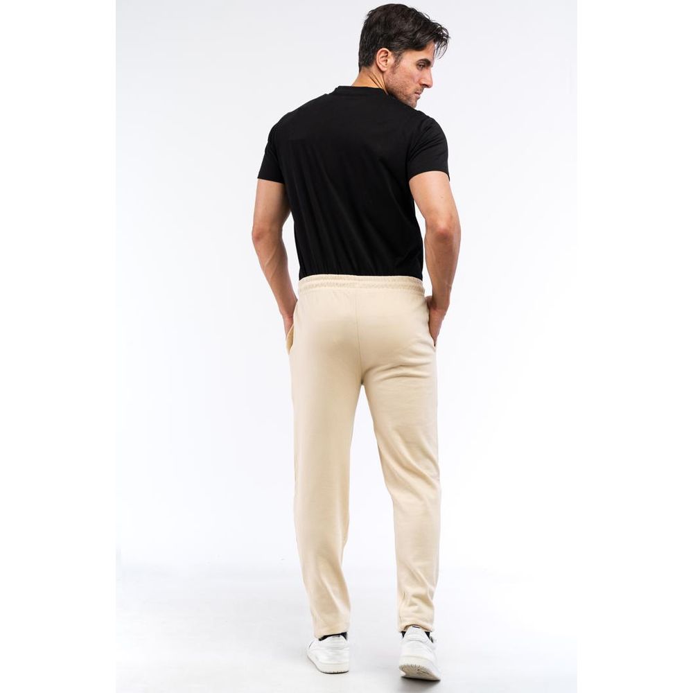 Indulge in the exquisite Cavalli Class Beige Cotton Athletic Pants, where luxurious craftsmanship meets timeless elegance, perfect for the discerning individual.
