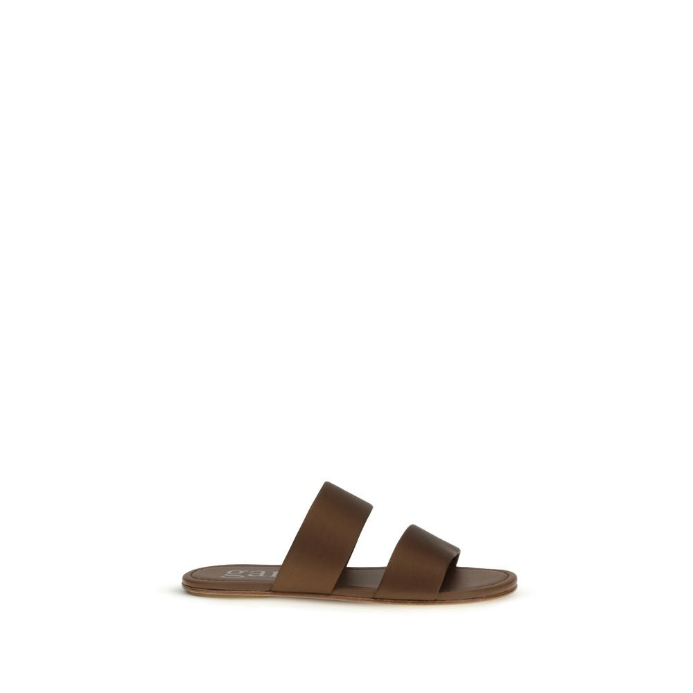 Step into the elegance of Pedro García's Brown Silk Flat Sandals, crafted from luxurious silk and calf leather, epitomizing refined sophistication for every occasion.