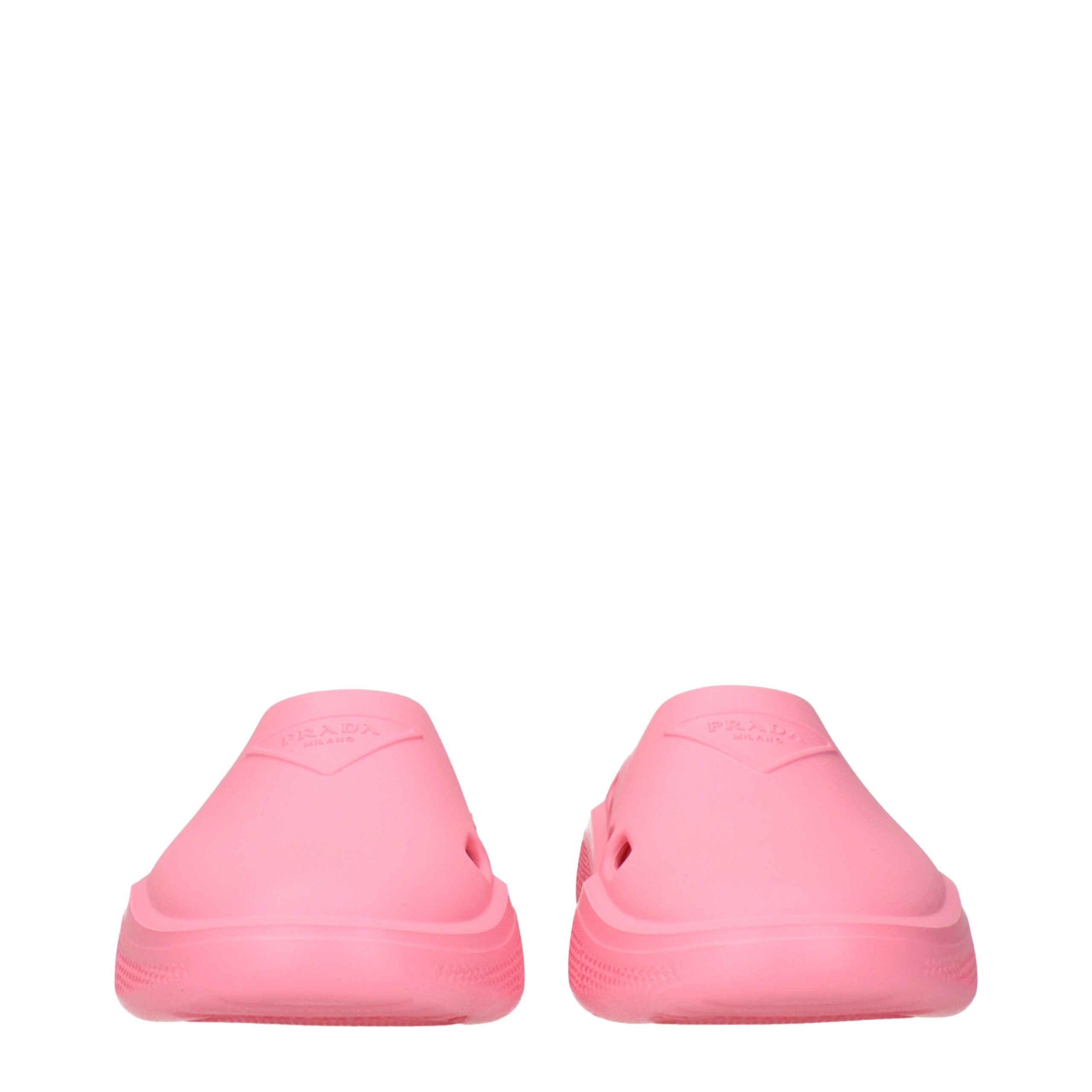 Indulge in the timeless elegance of Prada Pink Cotton Slippers, crafted from luxurious pink rubber for unmatched comfort and sophistication, perfect for discerning tastes.