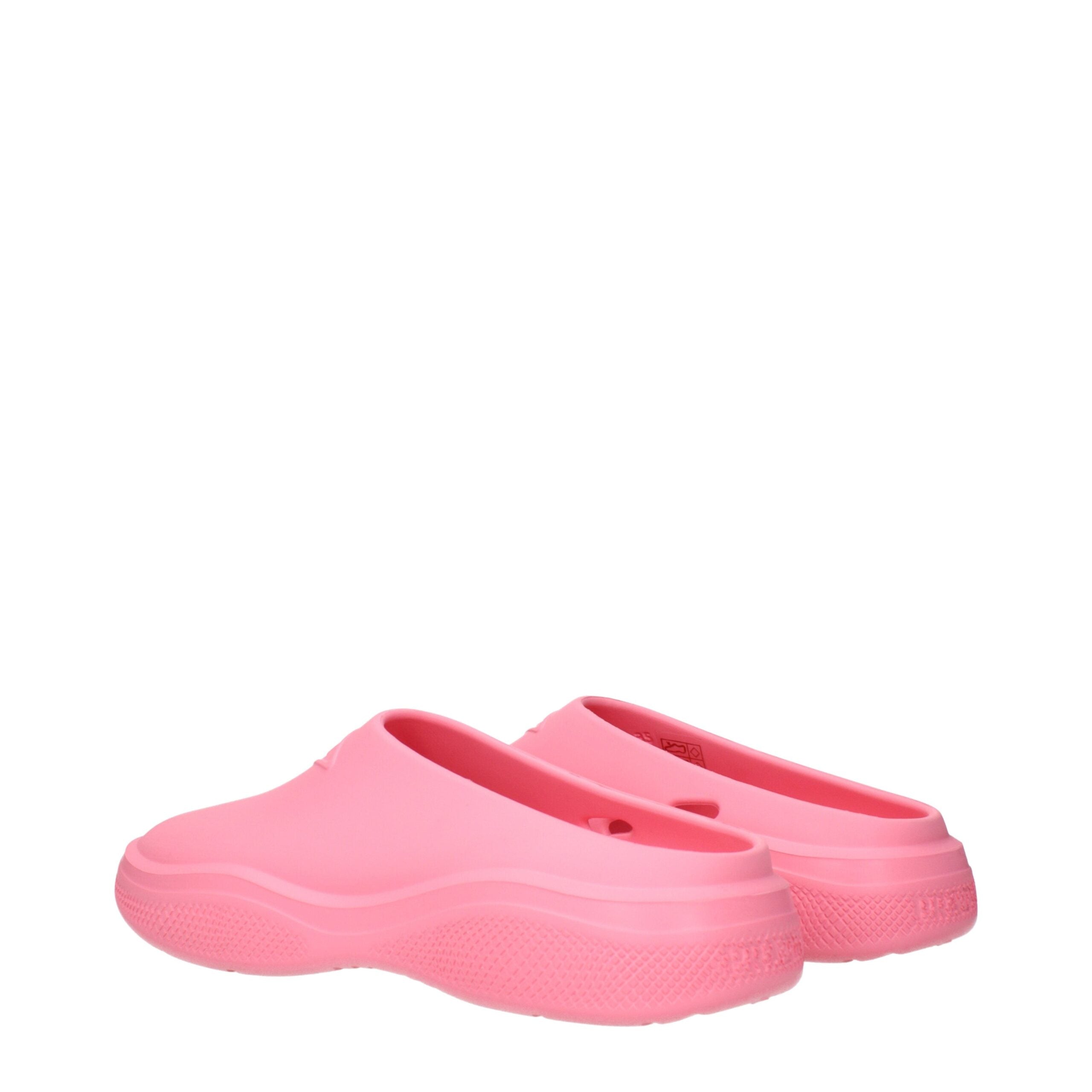Indulge in the timeless elegance of Prada Pink Cotton Slippers, crafted from luxurious pink rubber, embodying sophistication and effortless style for the discerning individual.