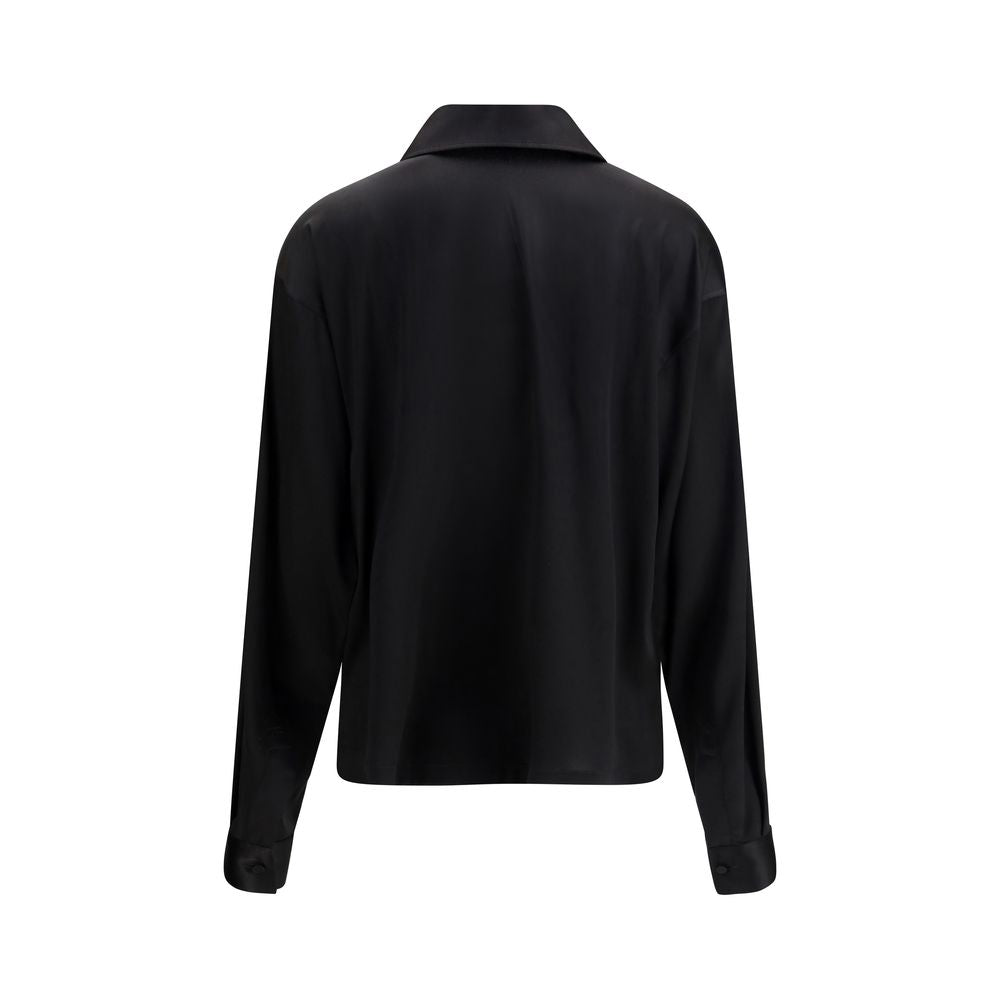 Experience the allure of the Tom Ford Black Silk Dress Shirt, crafted from luxurious silk and elastane, embodying sophistication and timeless elegance for the discerning individual.