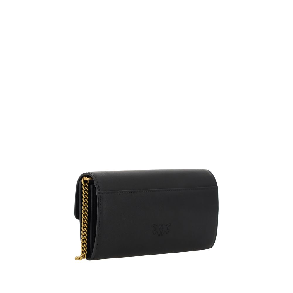 Discover the PINKO Black Calf Leather Bos Taurus Shoulder Bag, a timeless blend of exquisite craftsmanship and luxury, perfect for elevating any ensemble.