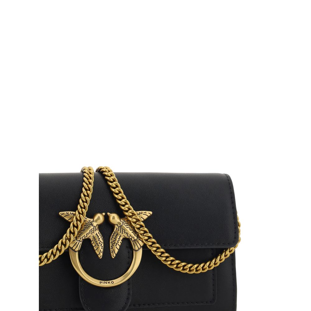 Indulge in the PINKO Black Calf Leather Bos Taurus Shoulder Bag, a symbol of timeless elegance and exquisite craftsmanship, perfect for elevating your luxury wardrobe.