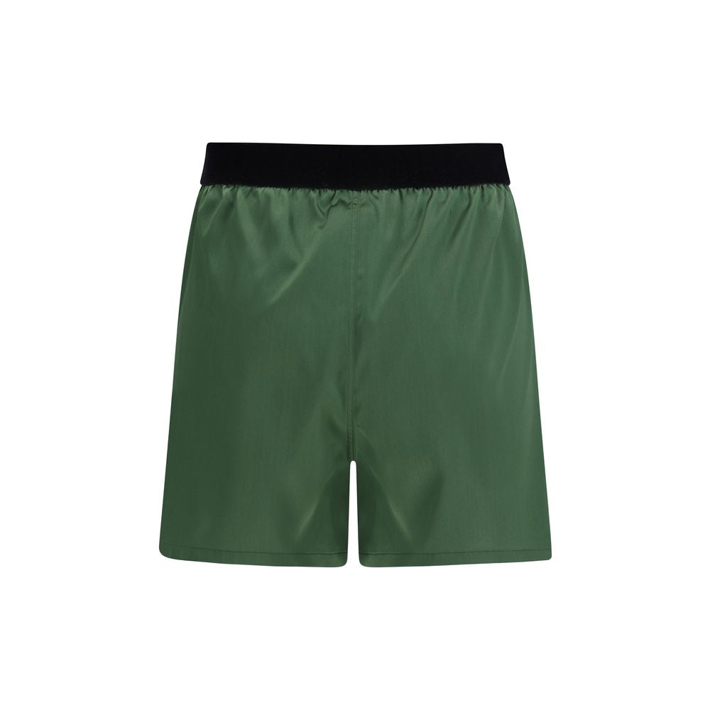 Elevate your wardrobe with Tom Ford Bicolor Silk Bermuda Shorts, crafted from luxurious silk satin for timeless elegance and effortless sophistication.