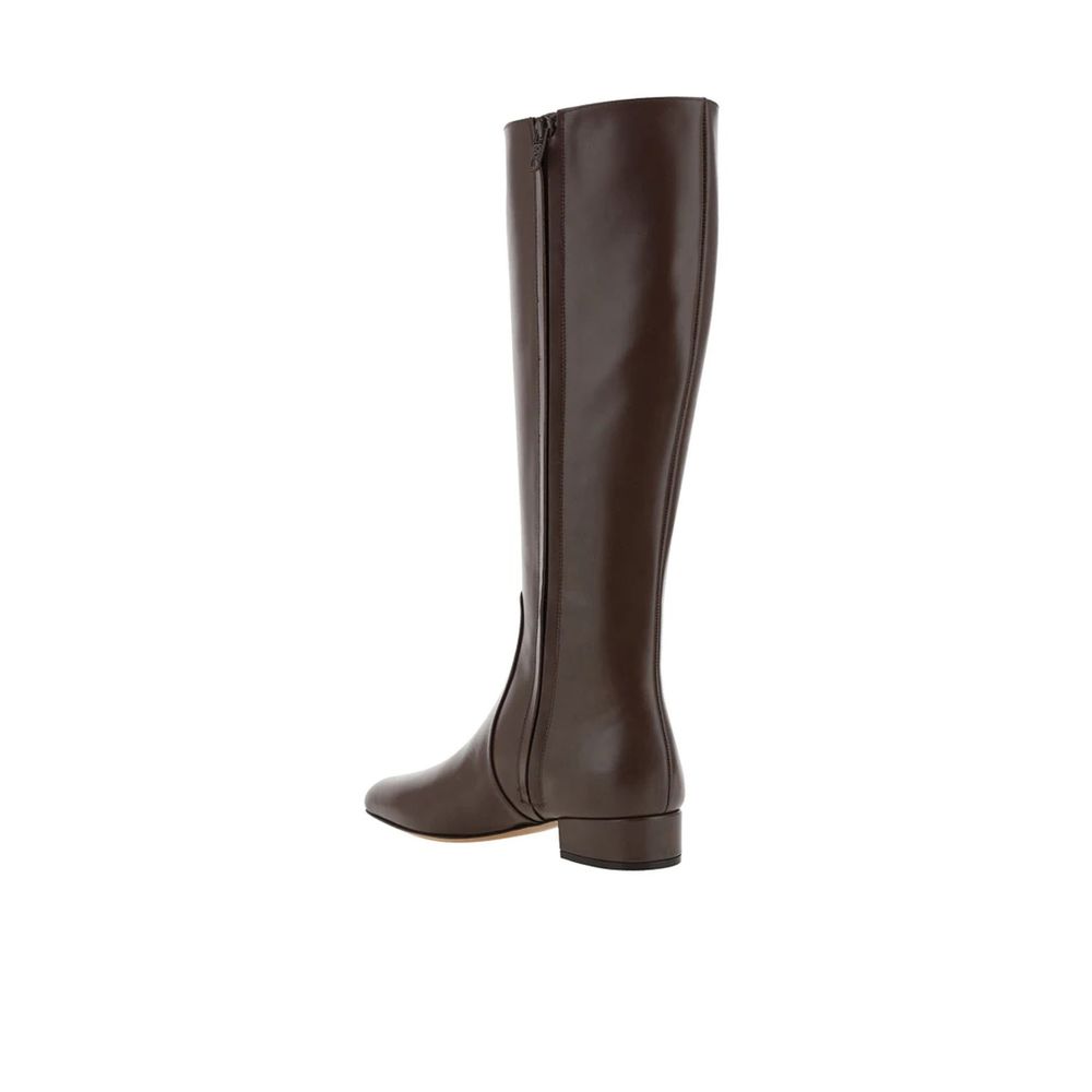 Indulge in the exquisite allure of Valentino Garavani's Brown Calfskin Lace-Up Boots, where timeless elegance meets exceptional craftsmanship for the discerning connoisseur.