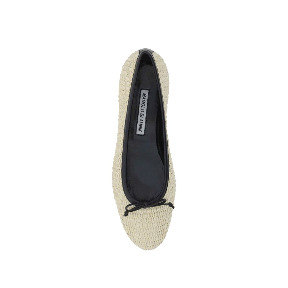 Indulge in the exquisite Manolo Blahnik Beige Raffia Ballet Flats, where artisanal craftsmanship meets luxurious comfort, perfect for the discerning individual.