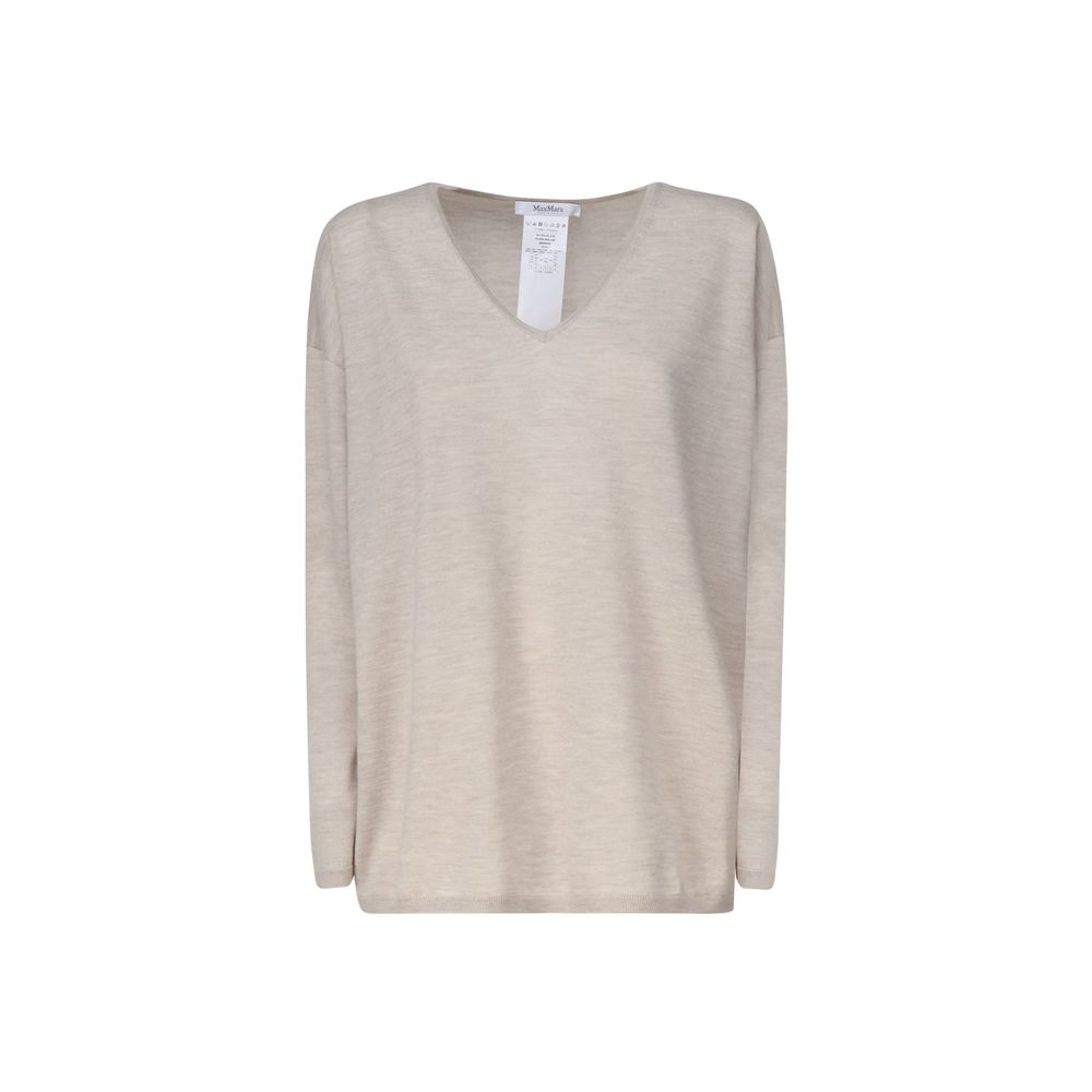 Experience the exquisite allure of the Max Mara Beige Cashmere Sweater, crafted from 100% cashmere for unparalleled elegance and comfort in every moment.