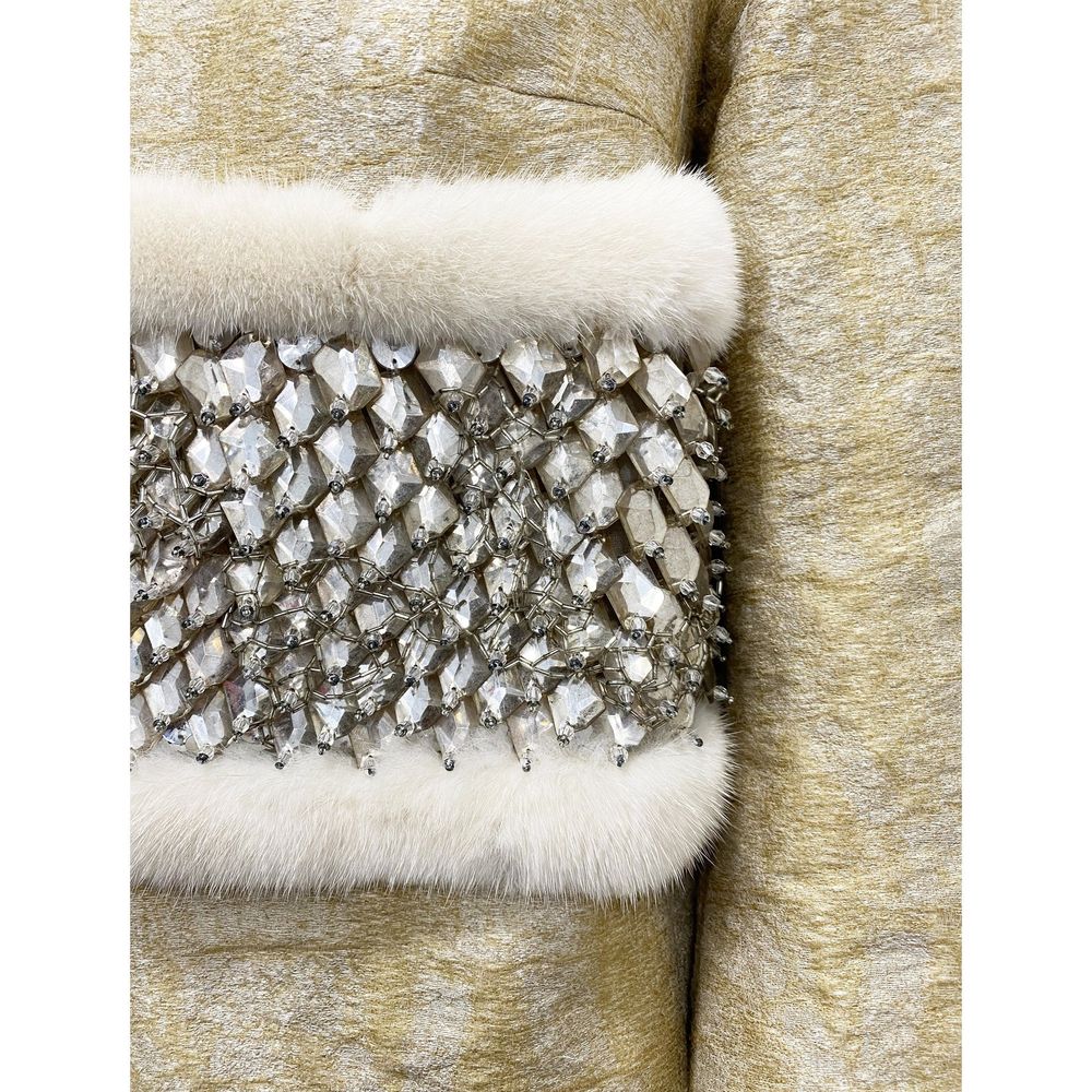 Elevate your wardrobe with the Dsquared² Beige Polyamide Coat, a masterpiece of Italian craftsmanship, featuring a luxurious mink fur collar and refined elegance for every occasion.