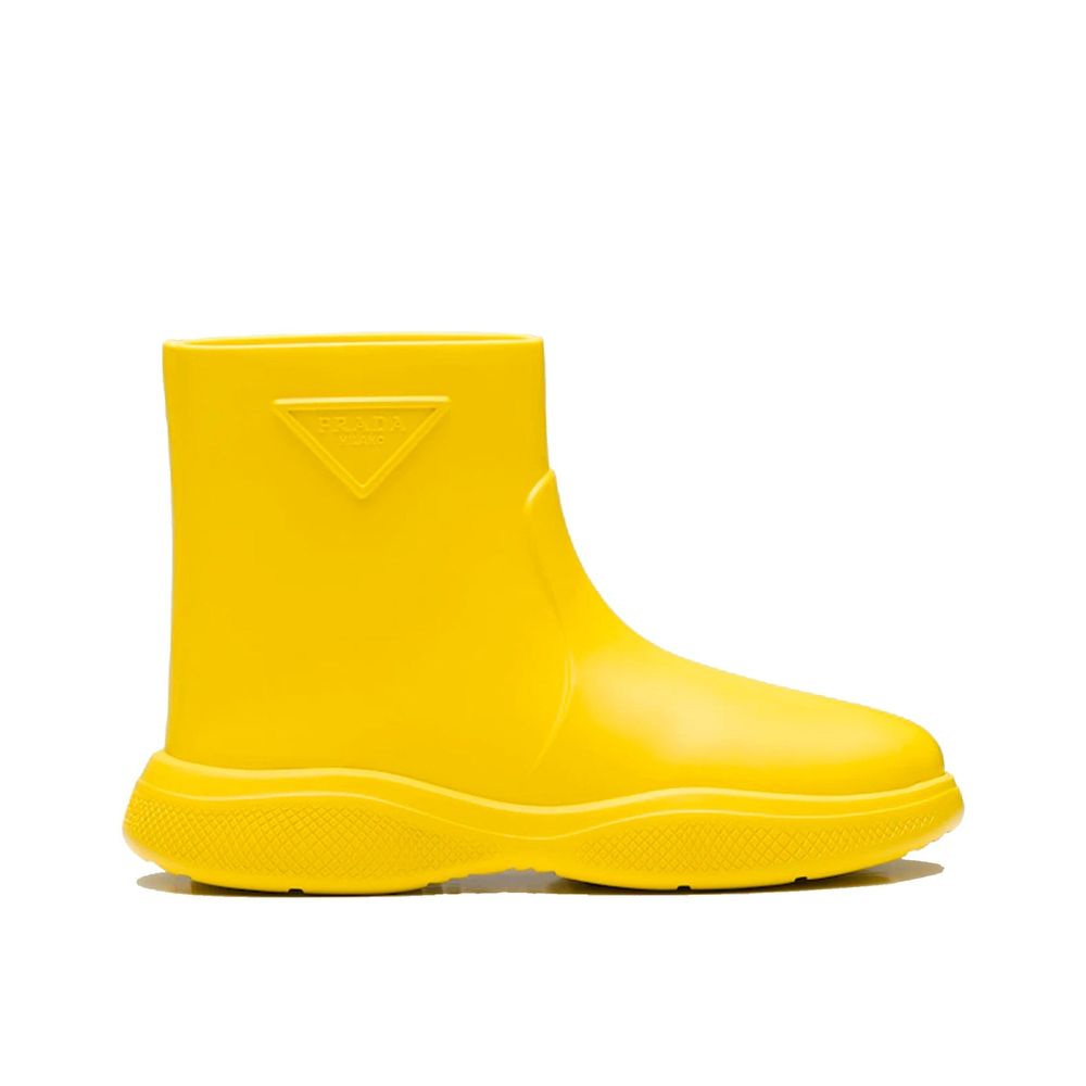 Discover the Prada Bicolor Rubber Rain Boots, where exquisite craftsmanship meets luxurious design, perfect for elevating any occasion with effortless elegance.