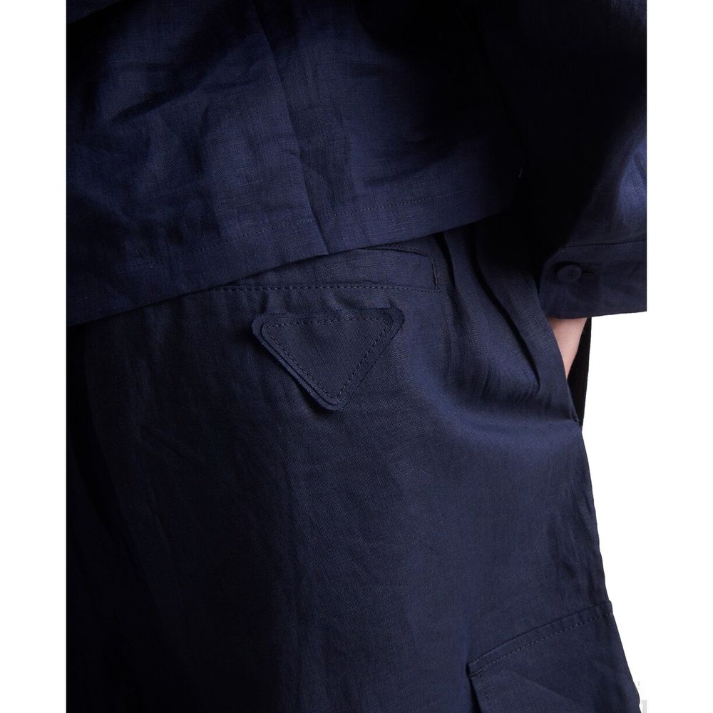 Discover the Prada Blue Linen Bermuda Shorts, a masterpiece of 100% linen craftsmanship that embodies modern elegance and effortless sophistication for discerning individuals.