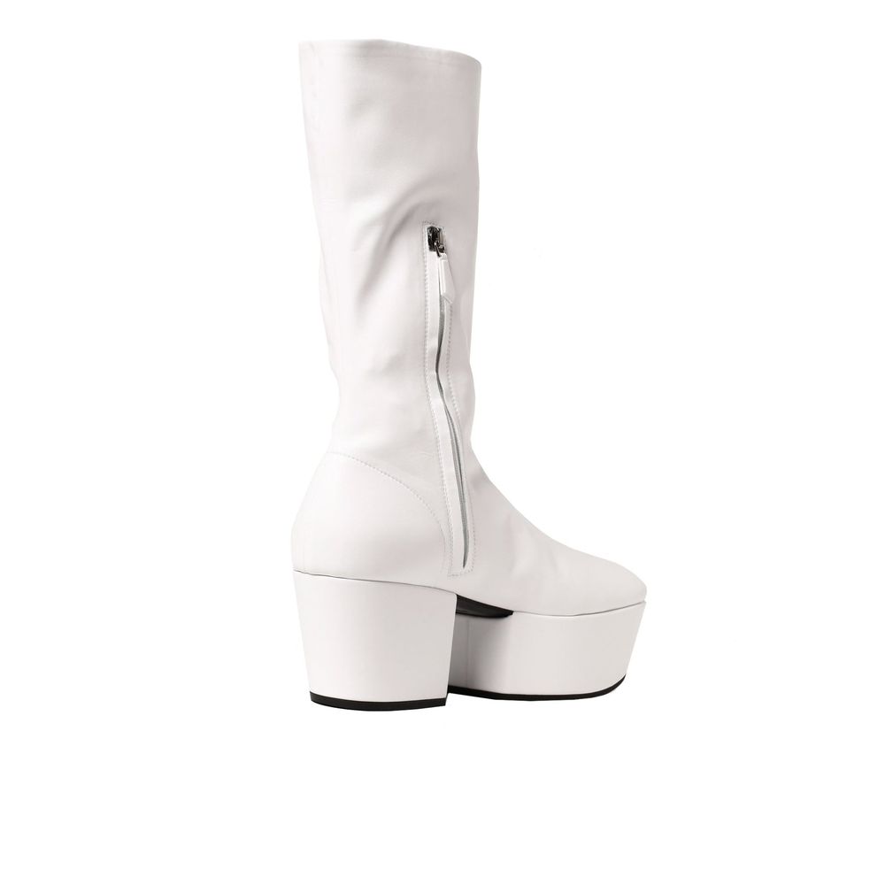 Elevate your style with Prada White Polyethylene Boots, crafted from luxurious polyurethane, merging exquisite craftsmanship with contemporary elegance for discerning tastes.