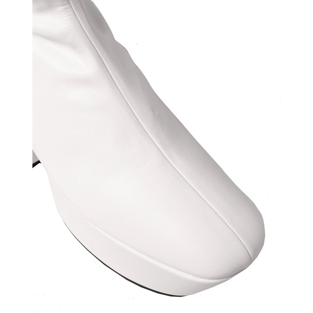 Elevate your style with Prada White Polyethylene Boots, crafted from luxurious polyurethane, blending sophistication and modernity for the discerning individual.