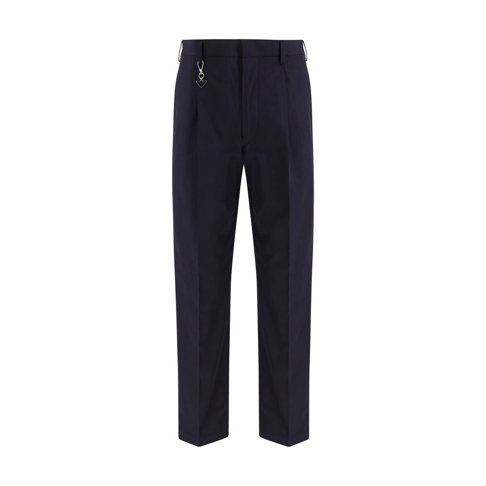 Elevate your wardrobe with Prada Blue Cotton Dress Pants, crafted from luxurious cotton poplin, embodying timeless elegance and meticulous craftsmanship for the discerning individual.