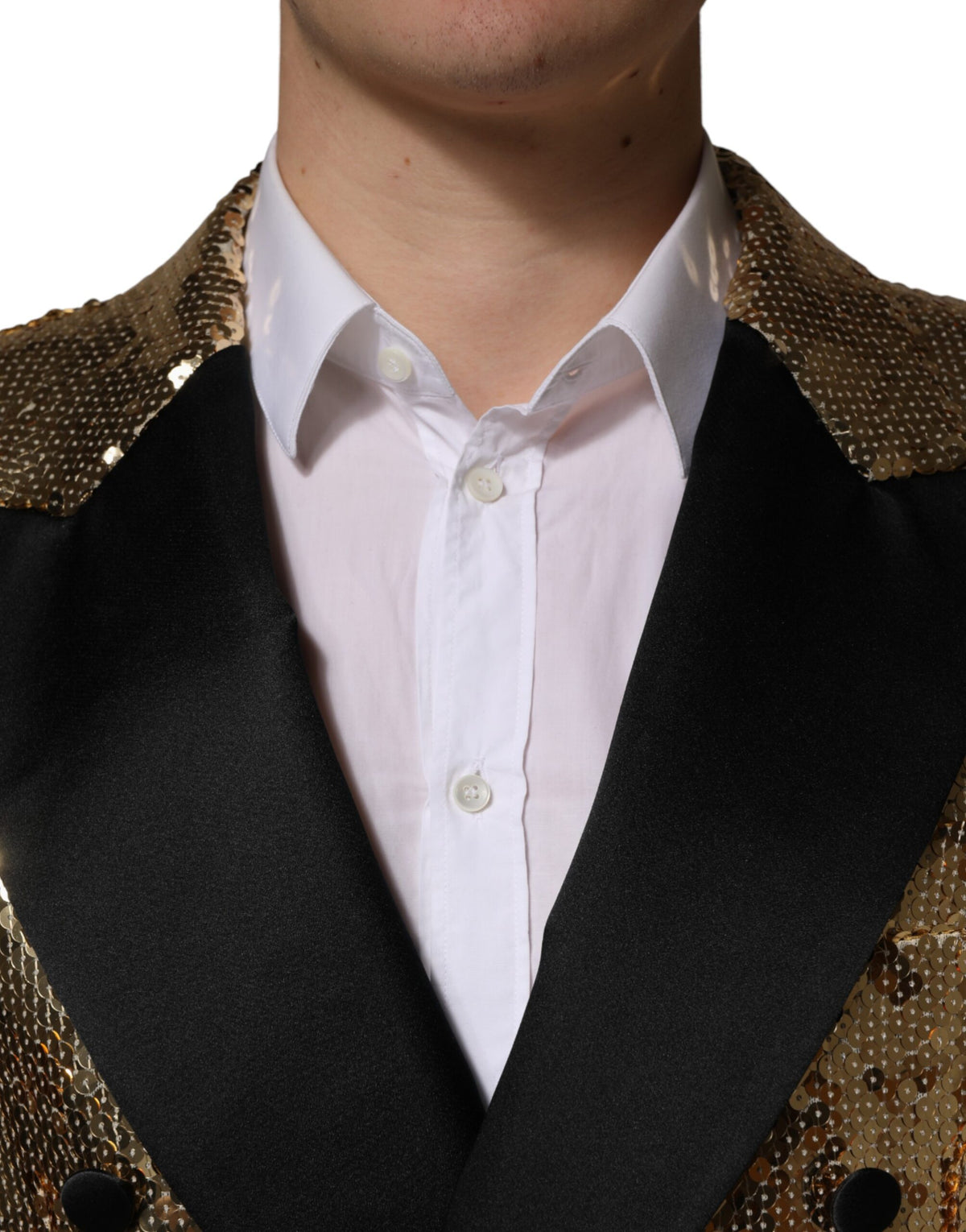 Elevate your wardrobe with the Dolce & Gabbana Gold Sequined Double Breasted Blazer, a masterpiece of Italian craftsmanship that embodies timeless elegance and sophistication.
