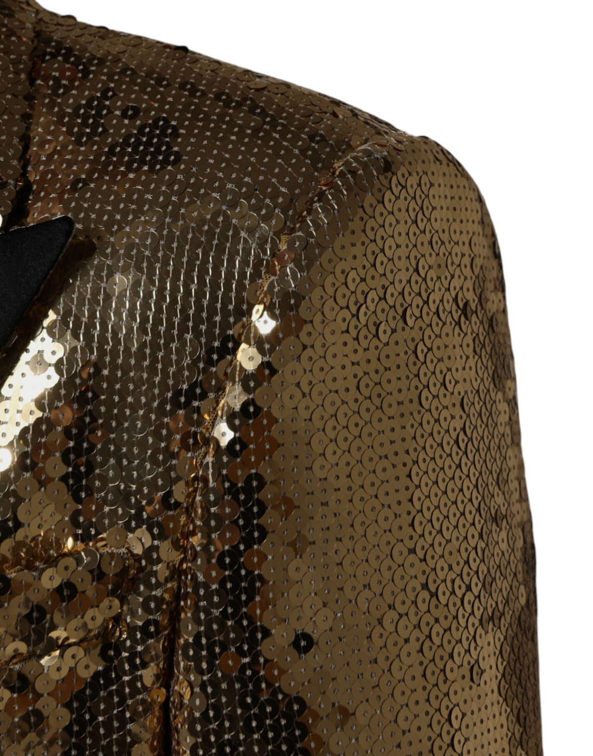 Elevate your style with the Dolce & Gabbana Gold Sequined Double Breasted Blazer, a masterpiece of Italian craftsmanship that embodies timeless elegance and allure.