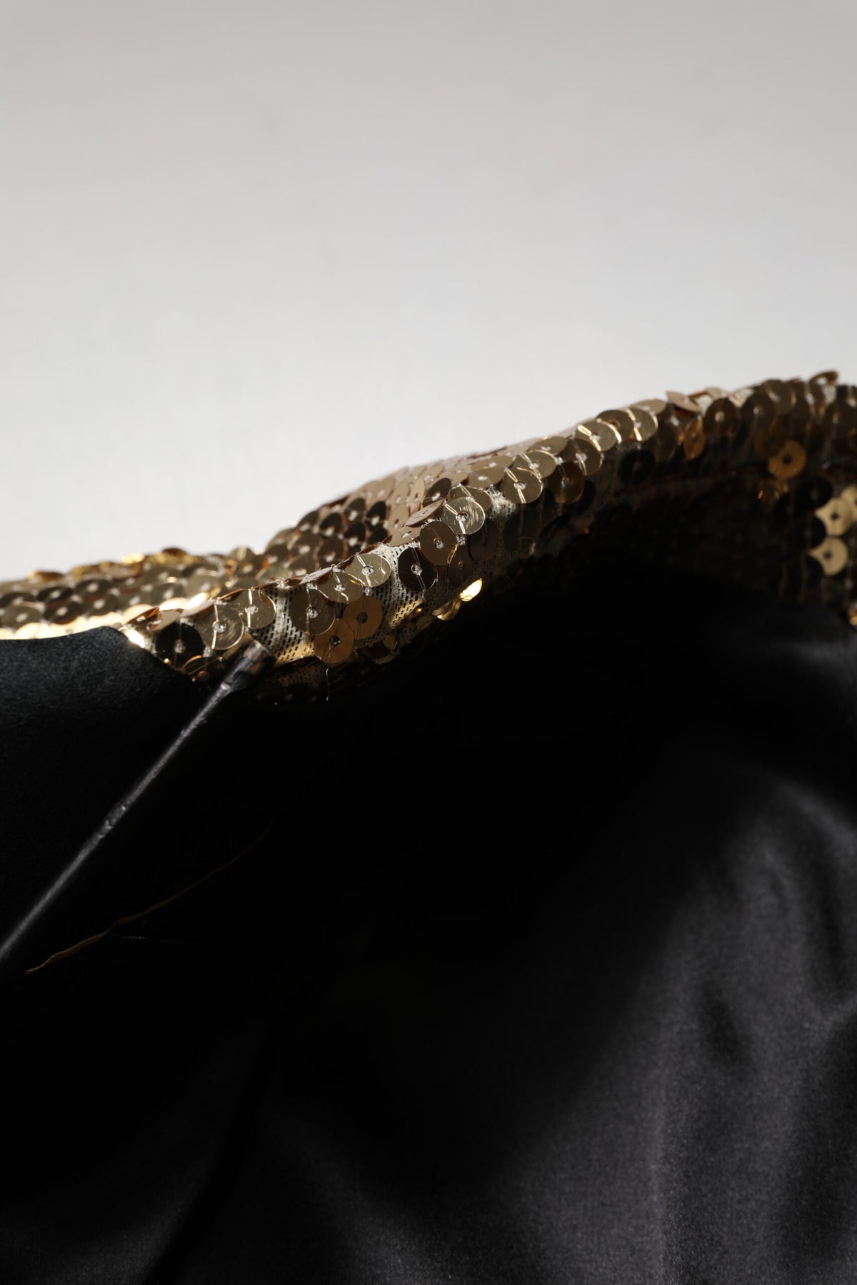 Elevate your wardrobe with the Dolce & Gabbana Gold Sequined Double Breasted Jacket Blazer, a masterpiece of Italian craftsmanship that embodies timeless elegance and sophistication.