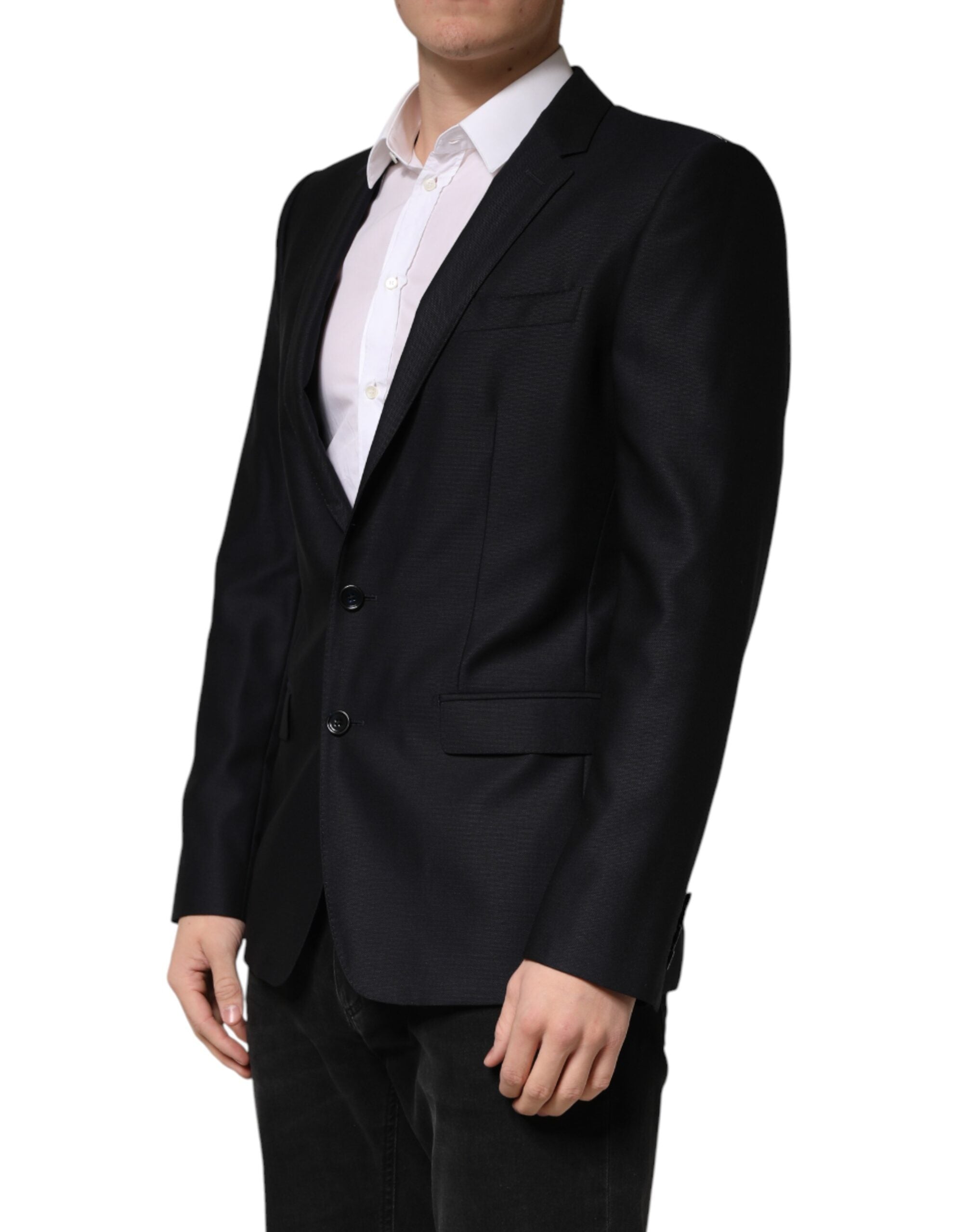 Elevate your wardrobe with the Dolce & Gabbana Black MARTINI blazer, a masterpiece of Italian craftsmanship in luxurious virgin wool, perfect for the discerning individual.