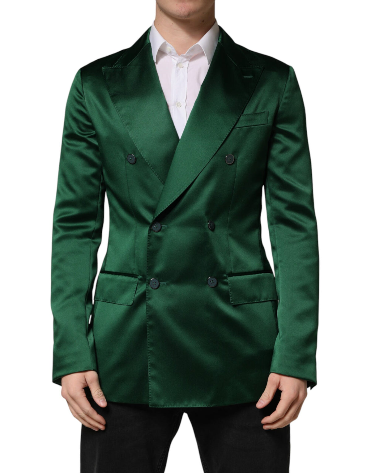 Indulge in the exquisite allure of the Dolce & Gabbana Green Satin Double Breasted Jacket Blazer, a masterpiece of Italian craftsmanship that redefines elegance and sophistication.