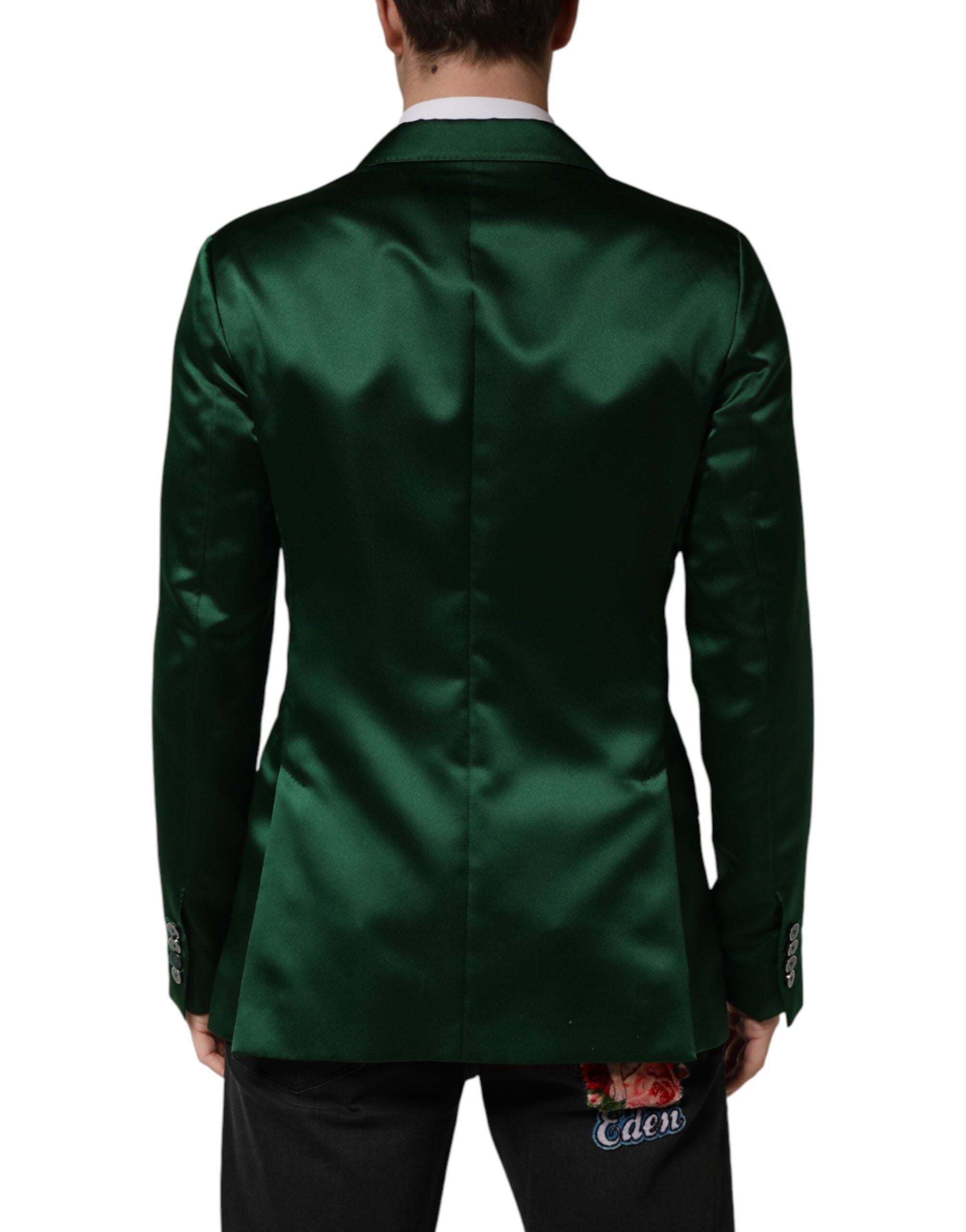 Indulge in the exquisite Dolce & Gabbana Green Satin Double Breasted Jacket Blazer, a masterpiece of Italian craftsmanship that redefines elegance for the discerning individual.