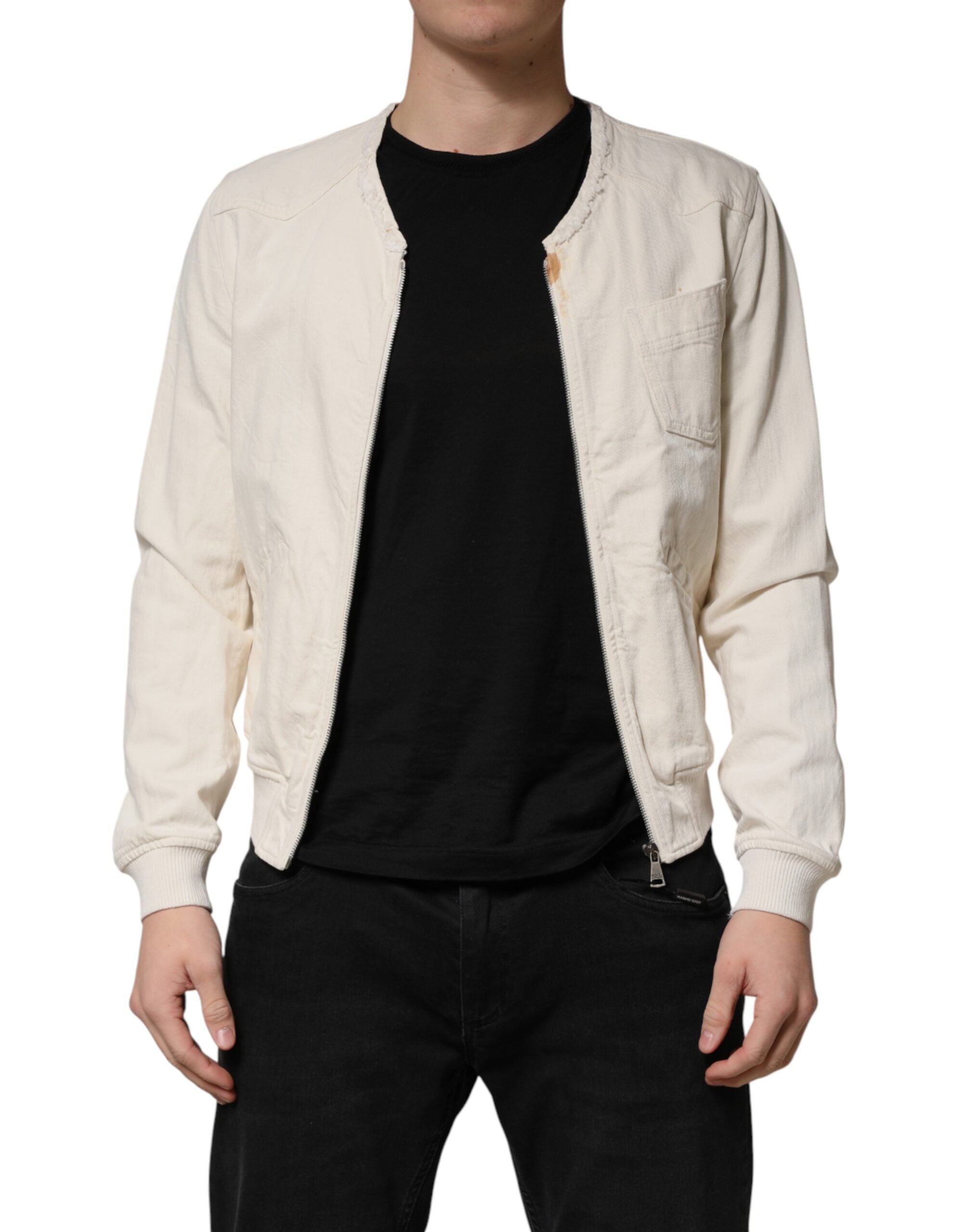 Discover the Dolce & Gabbana Off White Cotton Full Zip Denim Blouson Jacket, a symbol of Italian craftsmanship and timeless elegance, perfect for the discerning fashionista.