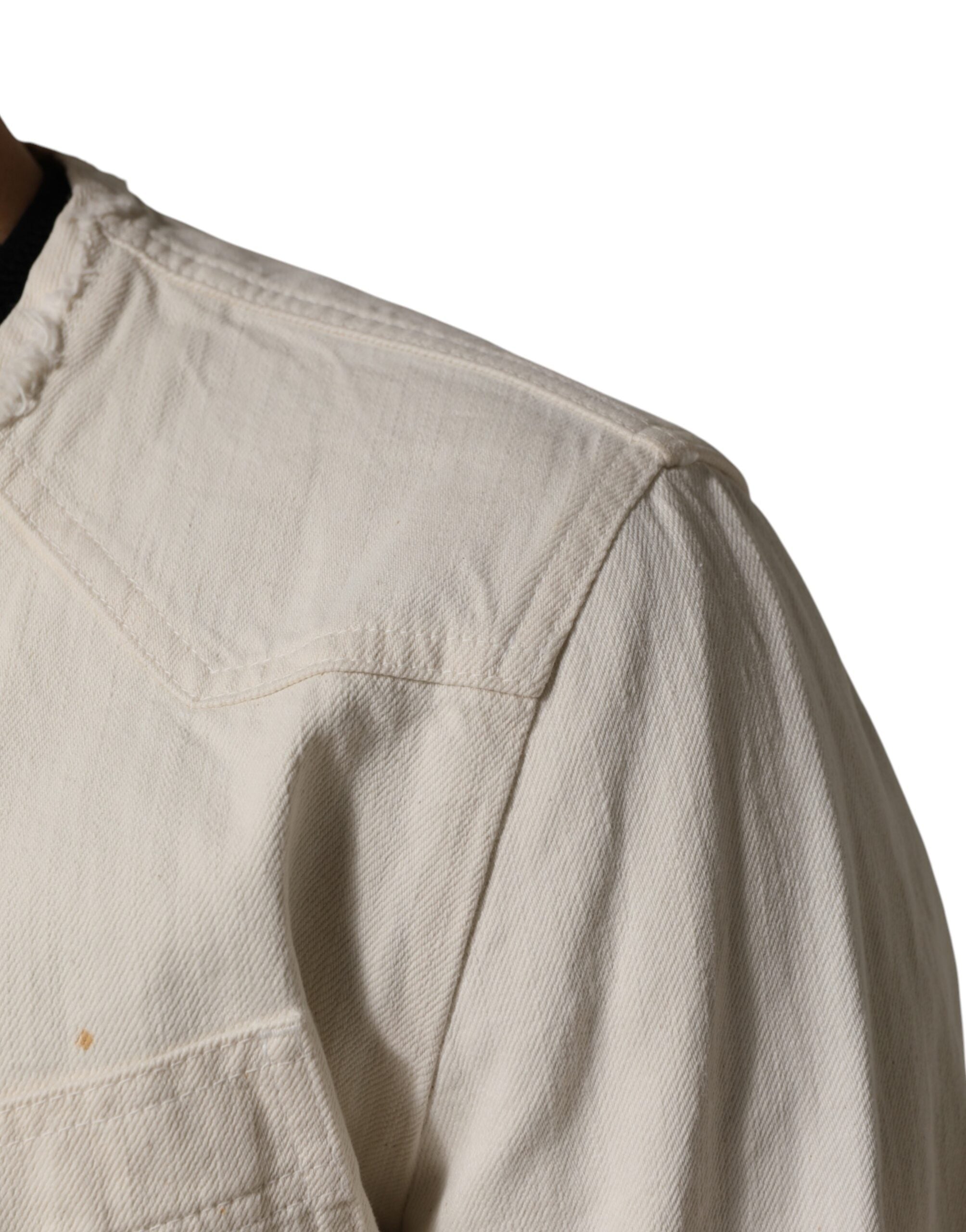 Indulge in the exquisite Dolce & Gabbana Off White Cotton Full Zip Denim Blouson Jacket, a testament to Italian craftsmanship that elevates your style with luxurious elegance.