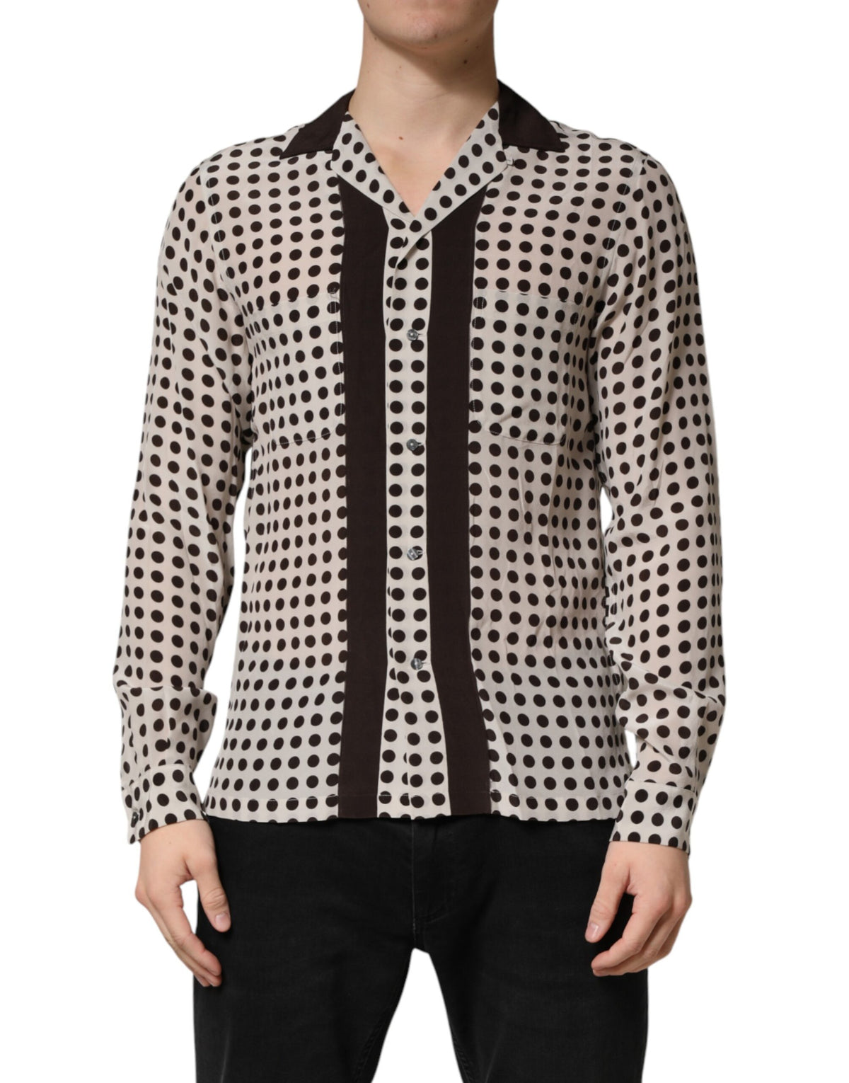 Elevate your style with the Dolce & Gabbana White Black Polka Dot Silk Shirt, a luxurious blend of exquisite craftsmanship and timeless elegance, perfect for any occasion.