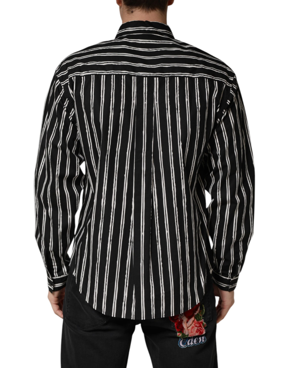 Discover the exquisite Dolce & Gabbana Black Stripes Cotton Dress Shirt, a symbol of refined elegance and unparalleled craftsmanship, perfect for any sophisticated occasion.