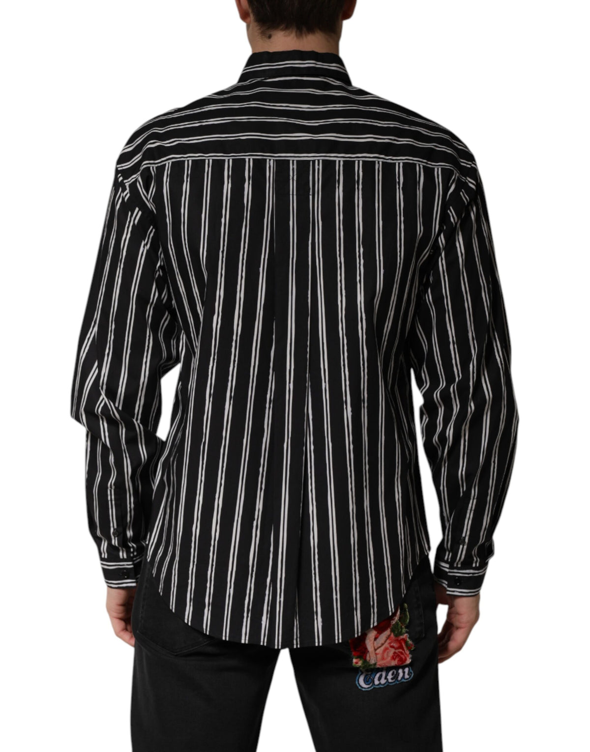 Elevate your wardrobe with the Dolce & Gabbana Black Stripes Cotton Dress Shirt, a testament to Italian craftsmanship that embodies timeless sophistication and luxury.