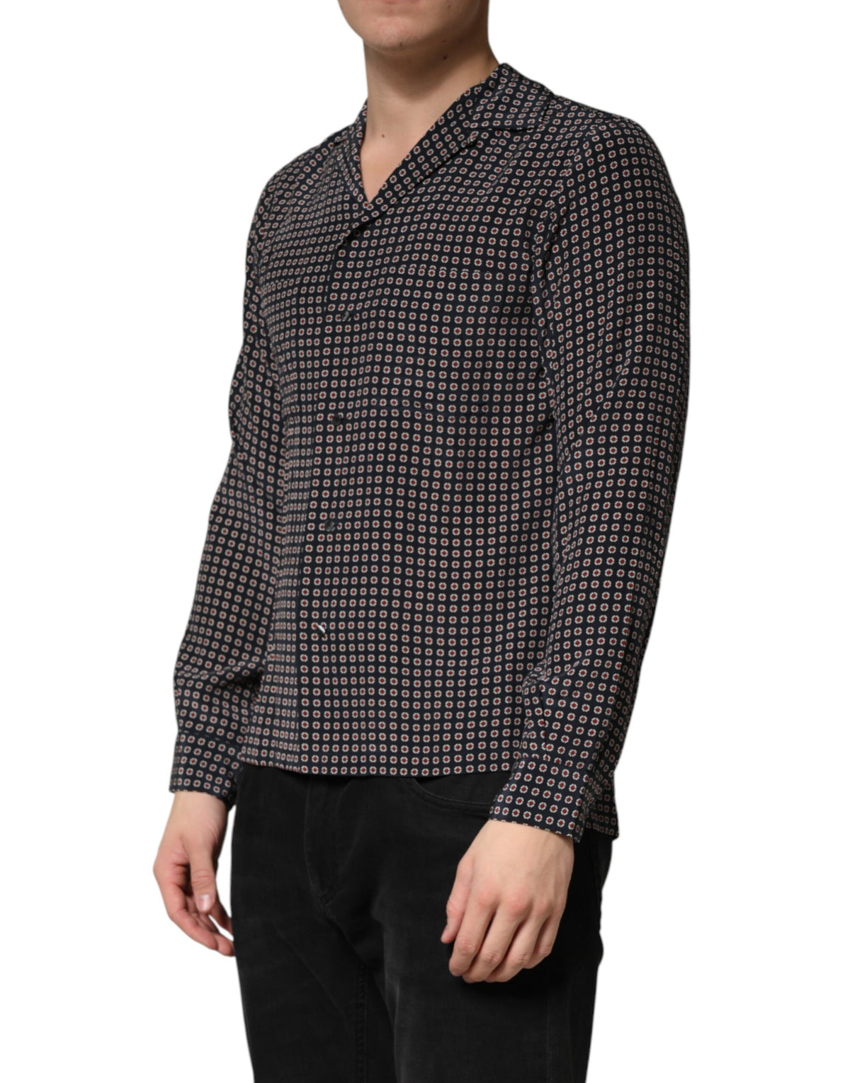 Discover the Dolce & Gabbana Black Patterned Silk Men Button Down Shirt, a masterpiece of Italian craftsmanship, perfect for those who embody elegance and sophistication.