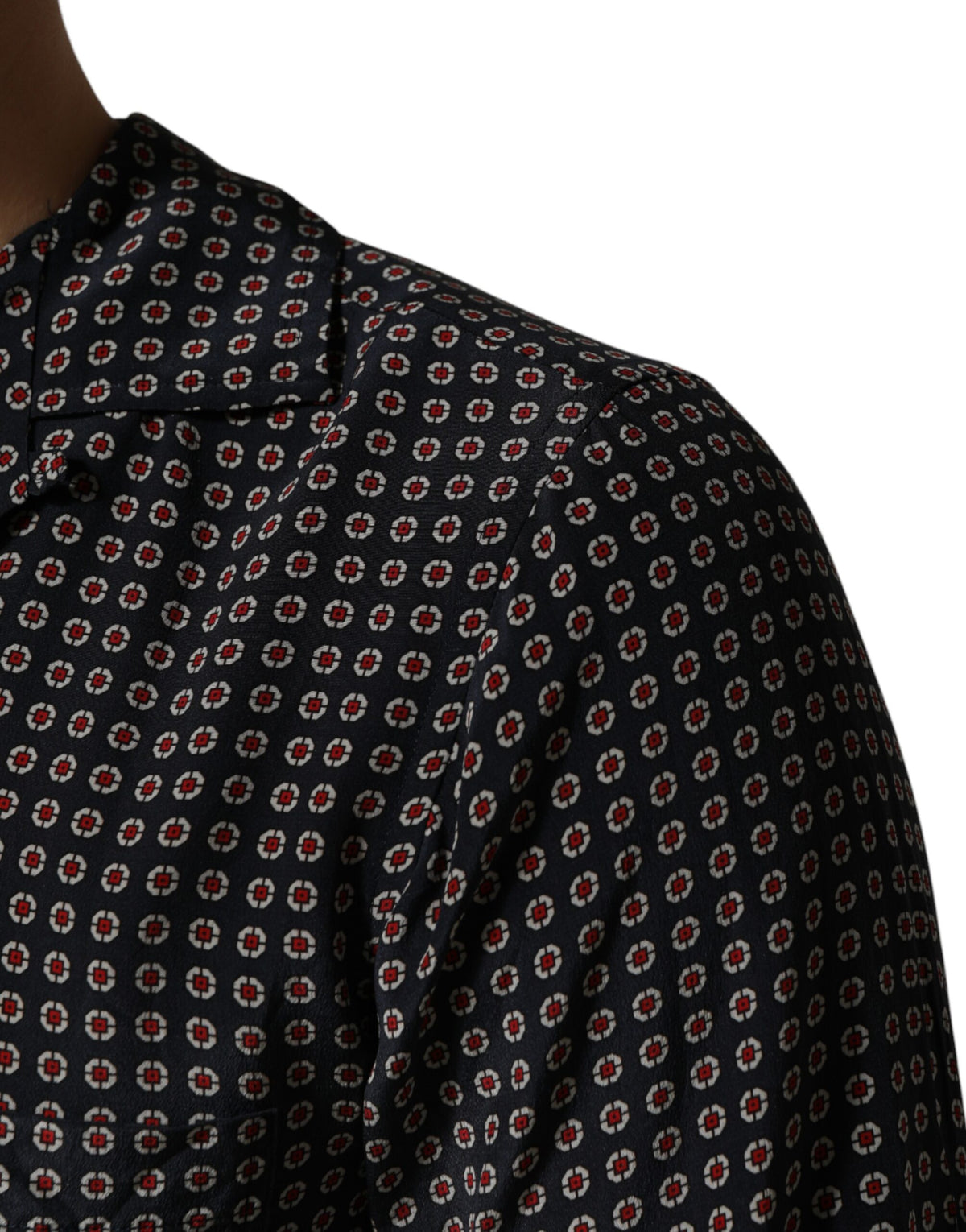 Indulge in the exquisite Dolce & Gabbana Black Patterned Silk Men Button Down Shirt, a timeless blend of luxurious silk and refined craftsmanship, perfect for sophisticated occasions.