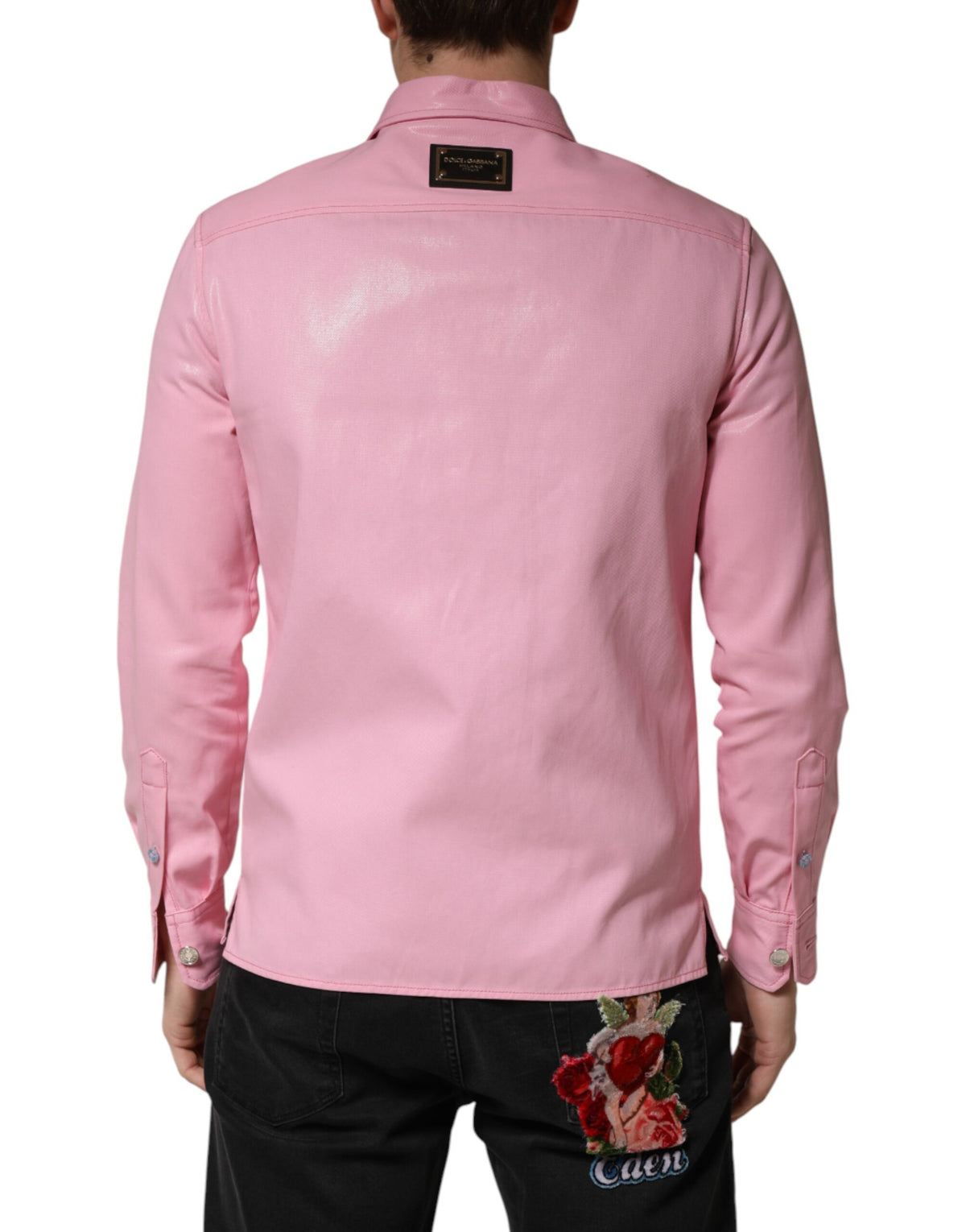 Elevate your wardrobe with the Dolce & Gabbana Pink Cotton Button Down Shirt, a masterpiece of Italian craftsmanship that embodies timeless elegance and refined luxury.