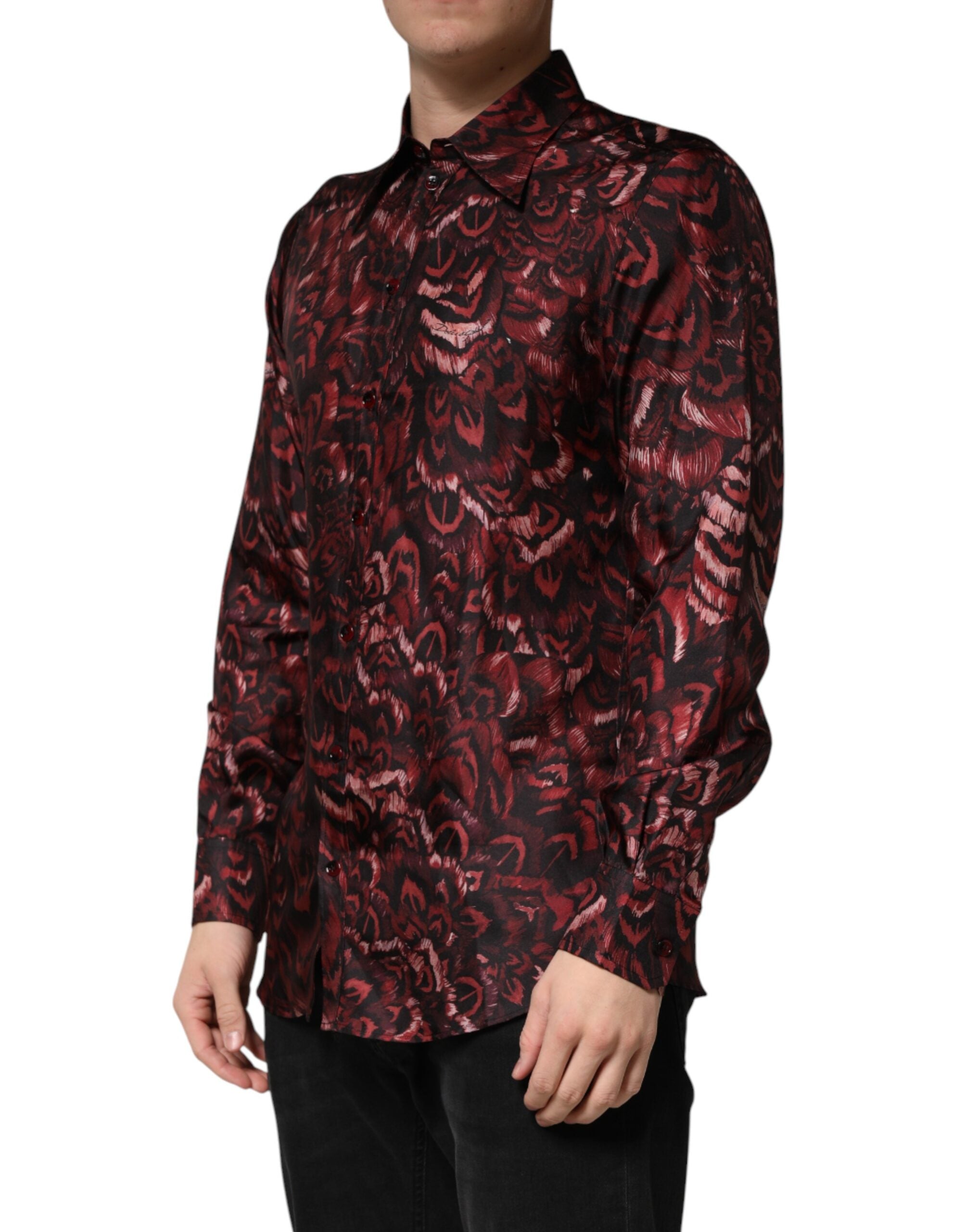 Experience the allure of the Dolce & Gabbana Bordeaux Patterned Collared Men Dress Shirt, a silk masterpiece that embodies sophistication and timeless elegance for any distinguished occasion.