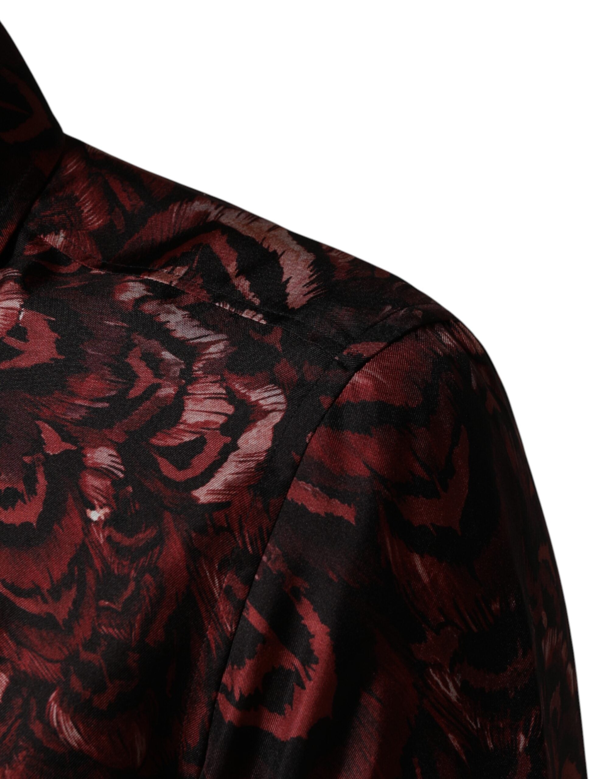 Indulge in the exquisite Dolce & Gabbana Bordeaux Patterned Collared Dress Shirt, a silk masterpiece that embodies sophistication and timeless elegance for any distinguished occasion.