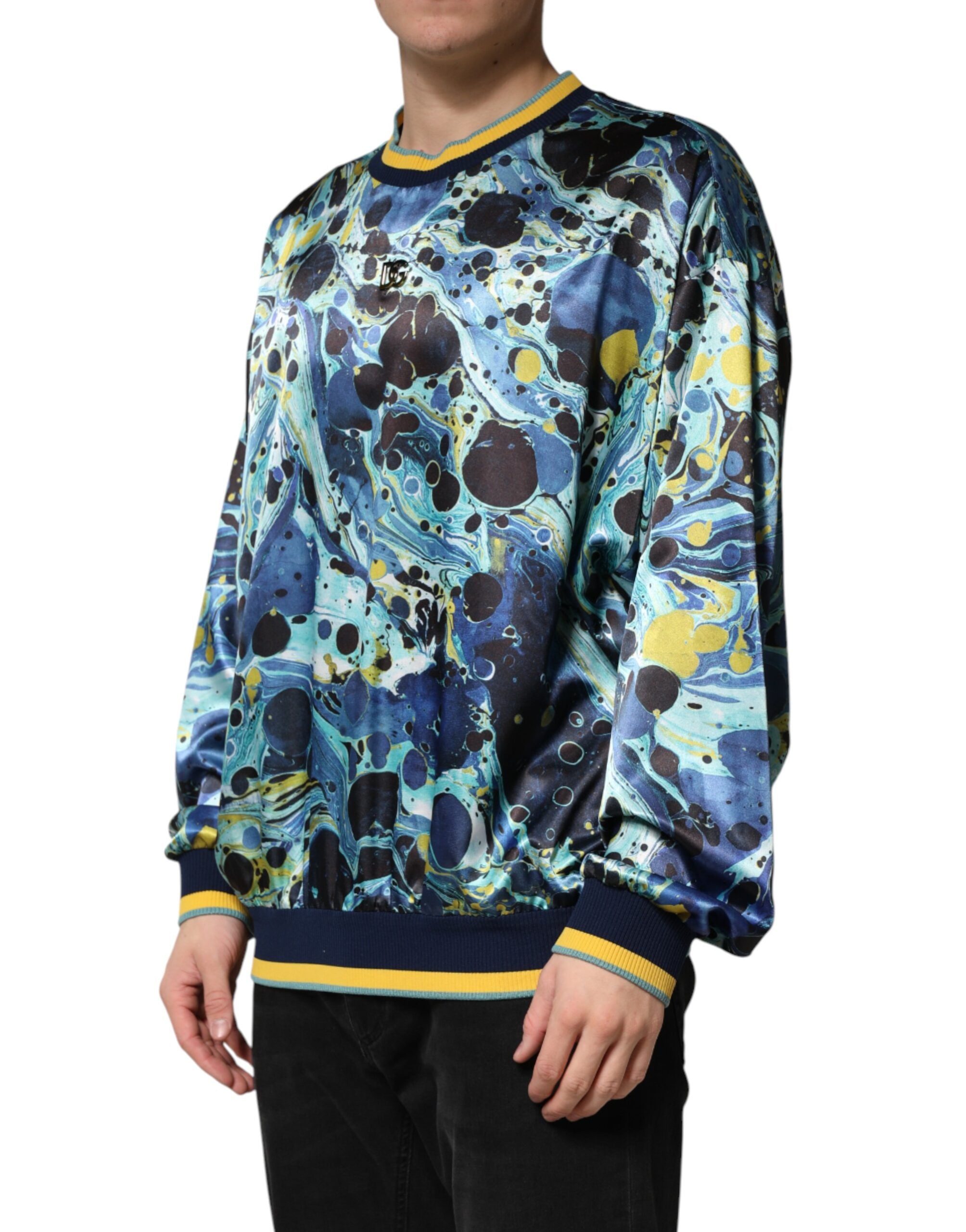 Elevate your wardrobe with the Dolce & Gabbana Multicolor Marble Print Pullover Sweater, a masterpiece of Italian craftsmanship blending luxury and effortless style.