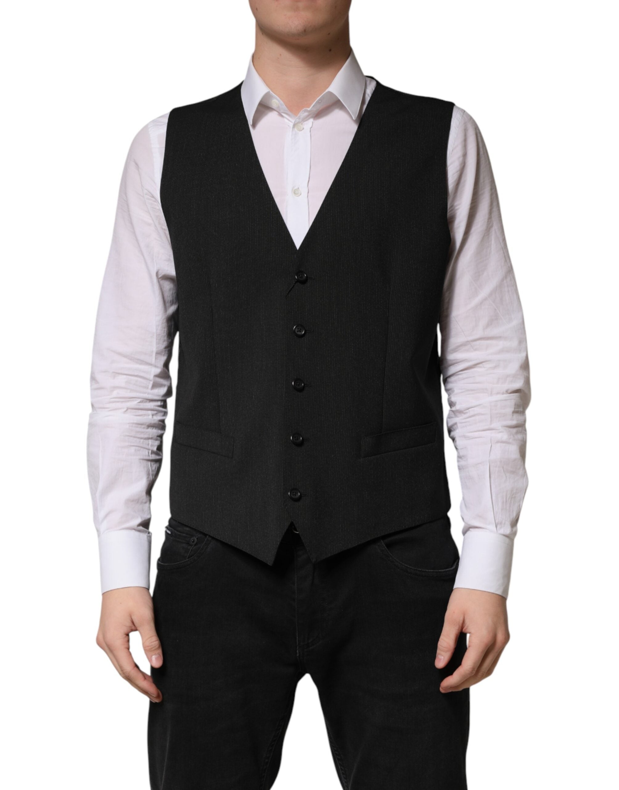 Elevate your formal attire with the Dolce & Gabbana Black Wool Dress Waistcoat Vest, crafted from exquisite virgin wool, embodying timeless elegance and Italian artistry.
