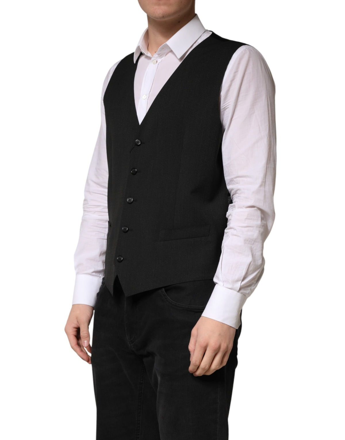 Elevate your formal wardrobe with the Dolce & Gabbana Black Wool Dress Waistcoat Vest, a masterpiece of Italian craftsmanship in luxurious virgin wool, perfect for the discerning individual.