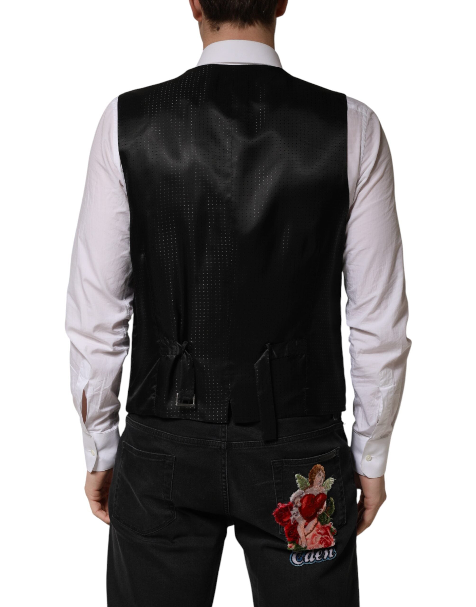 Elevate your formal attire with the Dolce & Gabbana Black Wool Dress Waistcoat Vest, a masterpiece of Italian craftsmanship in luxurious virgin wool, perfect for the discerning individual.