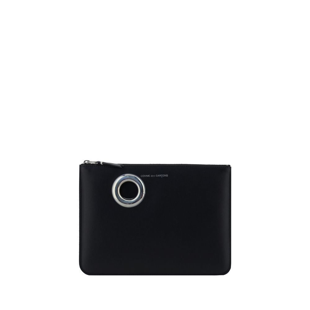 Discover the exquisite Comme Des Garçons Black Calf Leather Bos Taurus Wallet, a symbol of refined elegance and craftsmanship that elevates your style effortlessly.