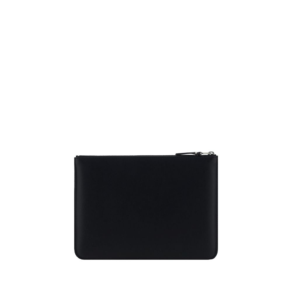 Indulge in the exquisite craftsmanship of the Comme Des Garçons Black Calf Leather Bos Taurus Wallet, a symbol of timeless elegance and refined luxury for the discerning individual.