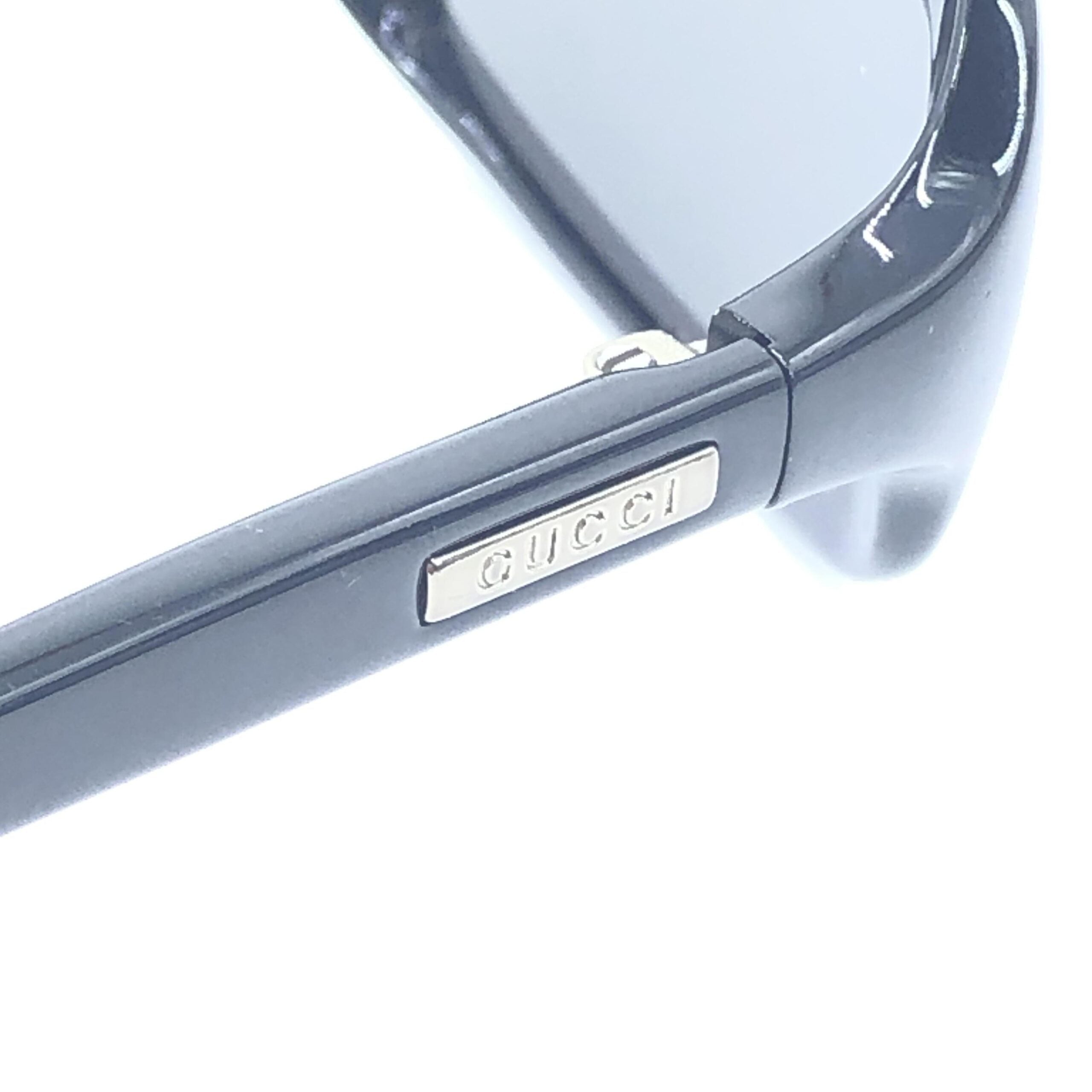 Gucci Black Sunglasses With Tinted Lenses